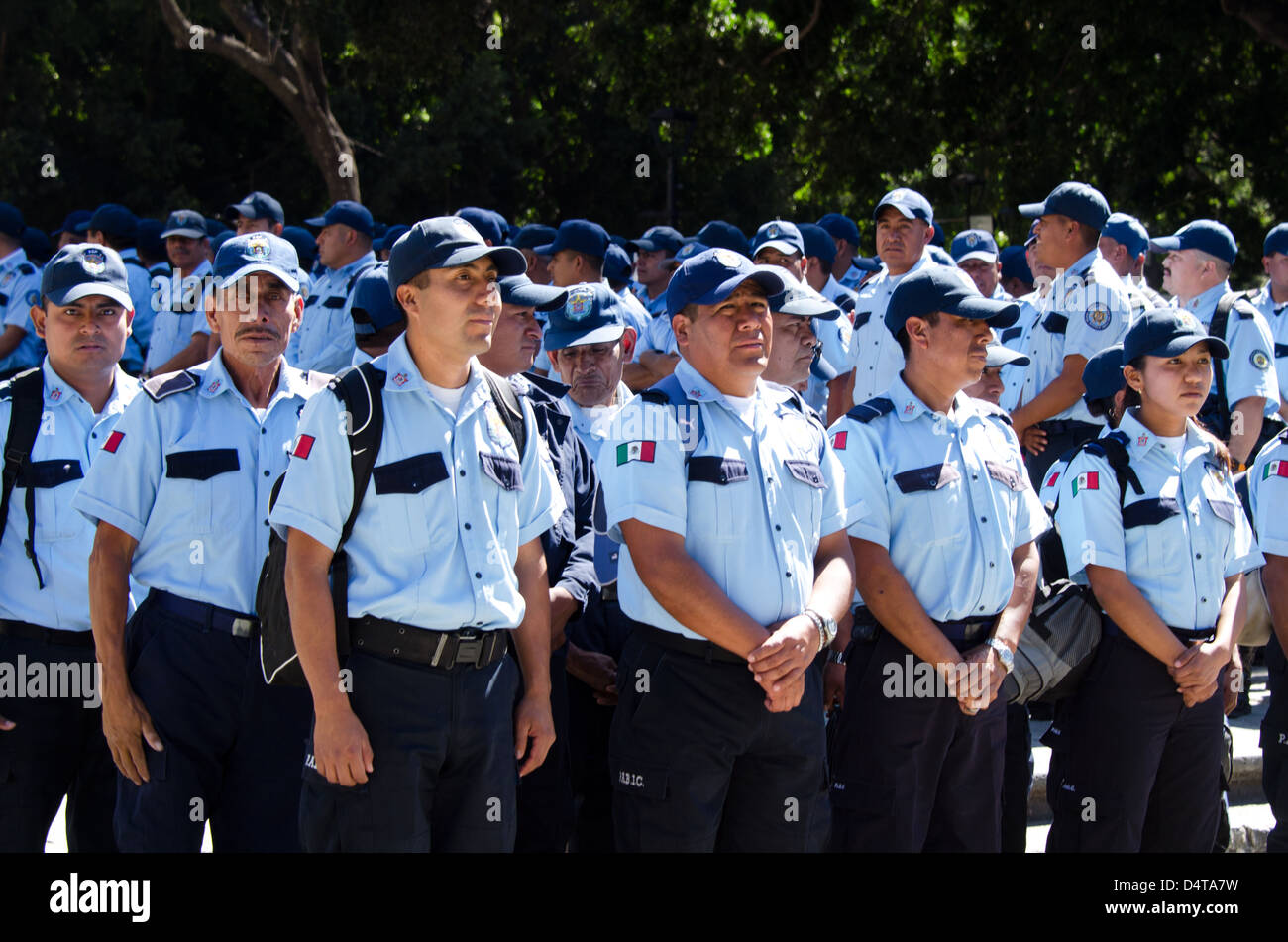Auxiliary Police assemble in the Zocalo to provide crowd control for the Noche de Rabanos festival, December 23, 2012 Stock Photo