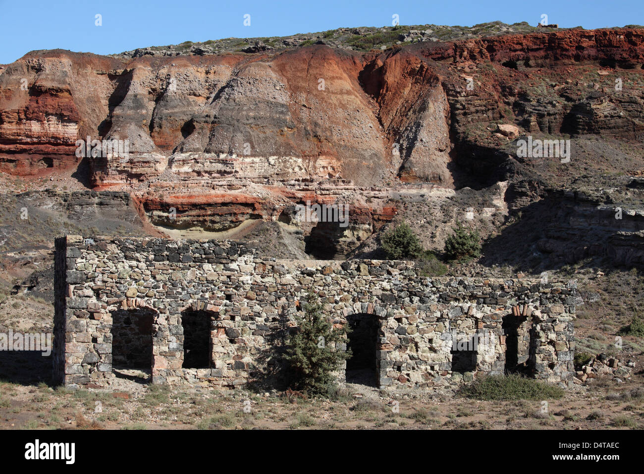Abandoned Manganese Mine at Cape Vani, Milos Island, Greece. Image shows ruined building. Stock Photo
