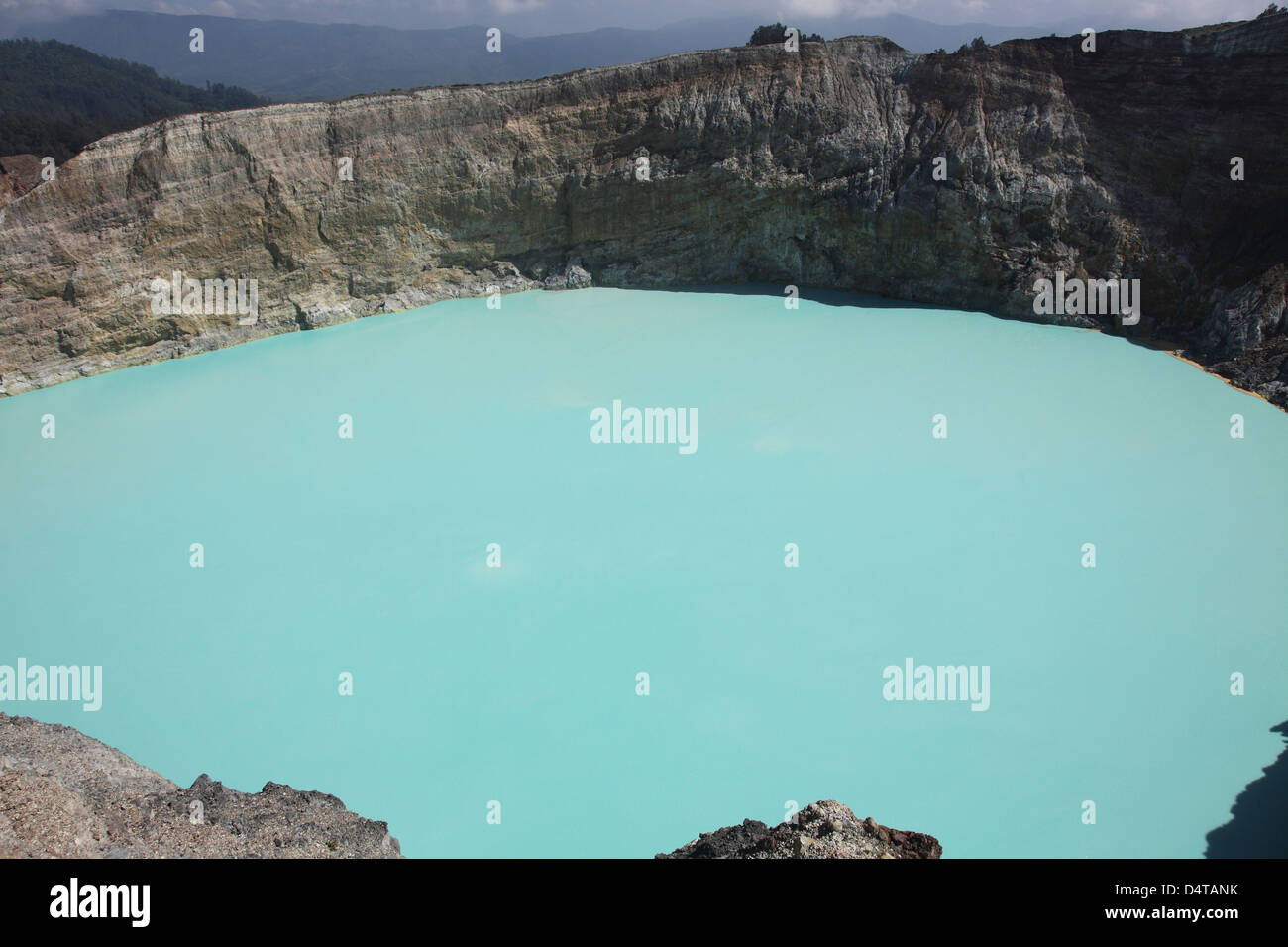 Turquoise crater lake of Kelimutu volcano, Flores Island, Indonesia. Stock Photo
