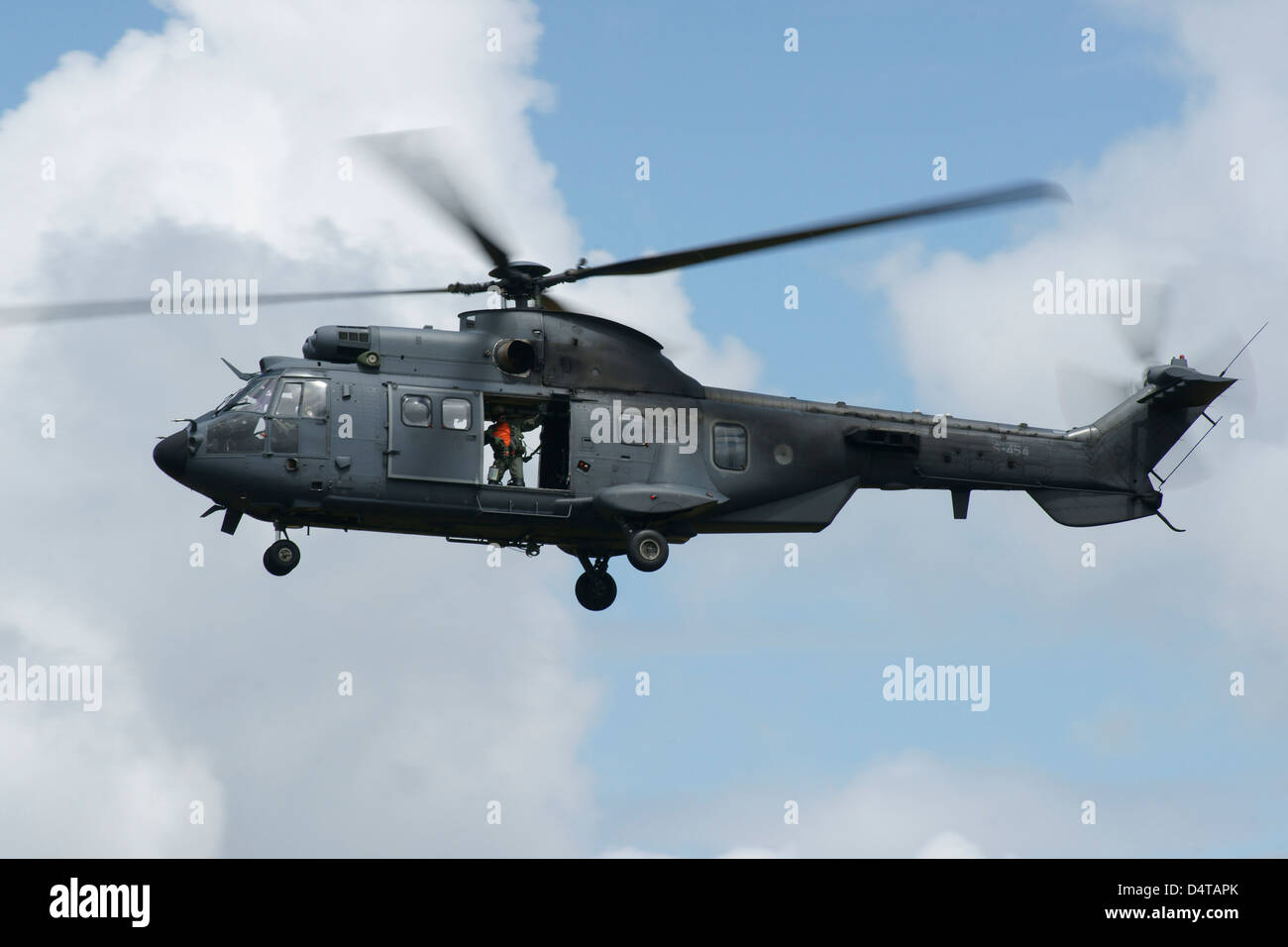 June 19, 2010 - A Eurocopter AS532 Cougar of the Royal Netherlands Air Force in flight over Volkel, the Netherlands. Stock Photo