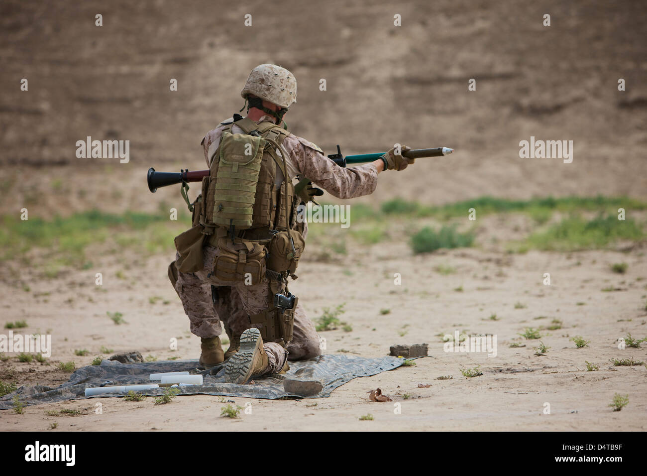 U.S. Marine prepares a fragmentation round for the RPG-7. Stock Photo