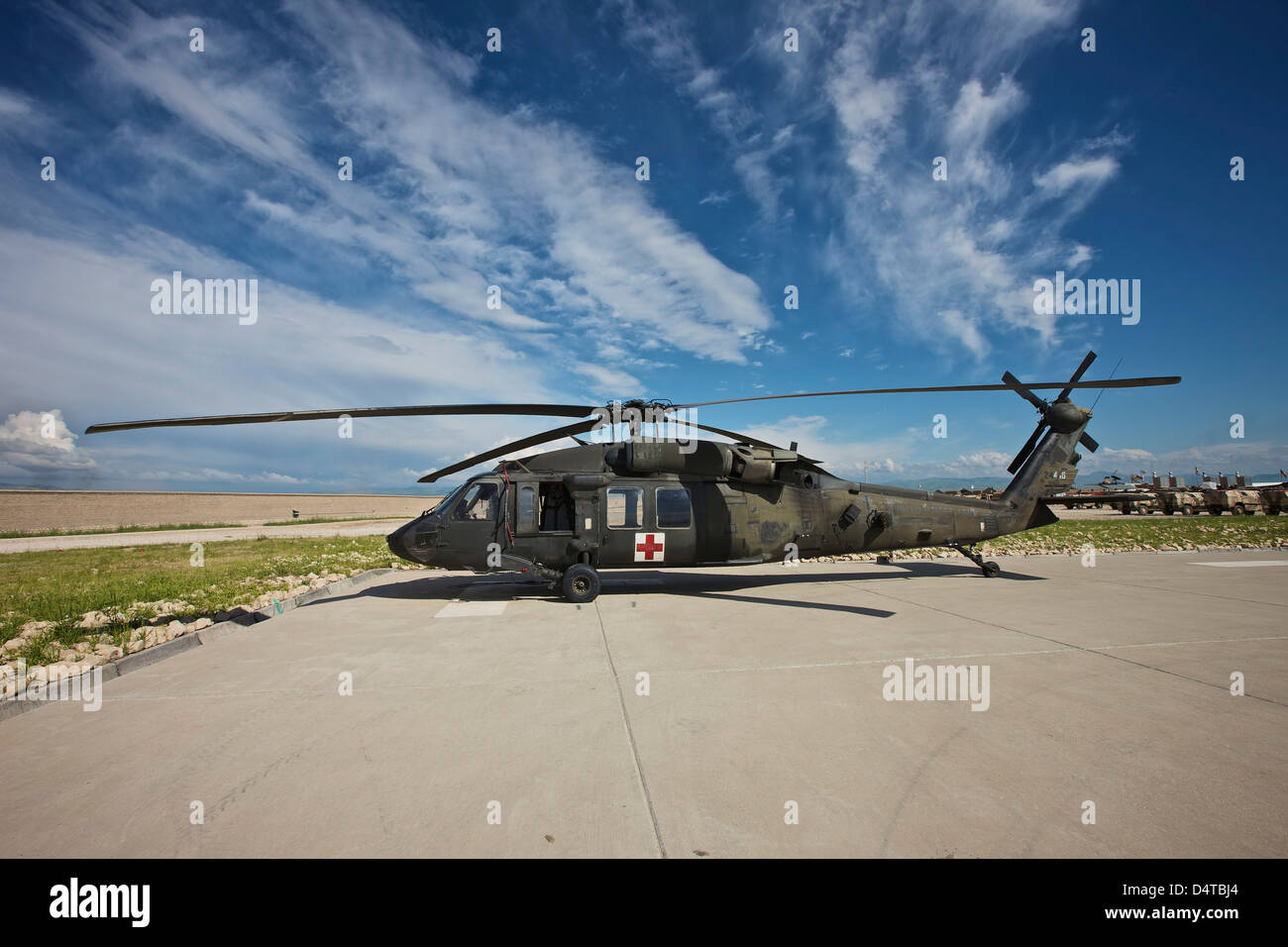 A UH-60L Blackhawk parked on its pad in Kunduz, Afghanistan. Stock Photo