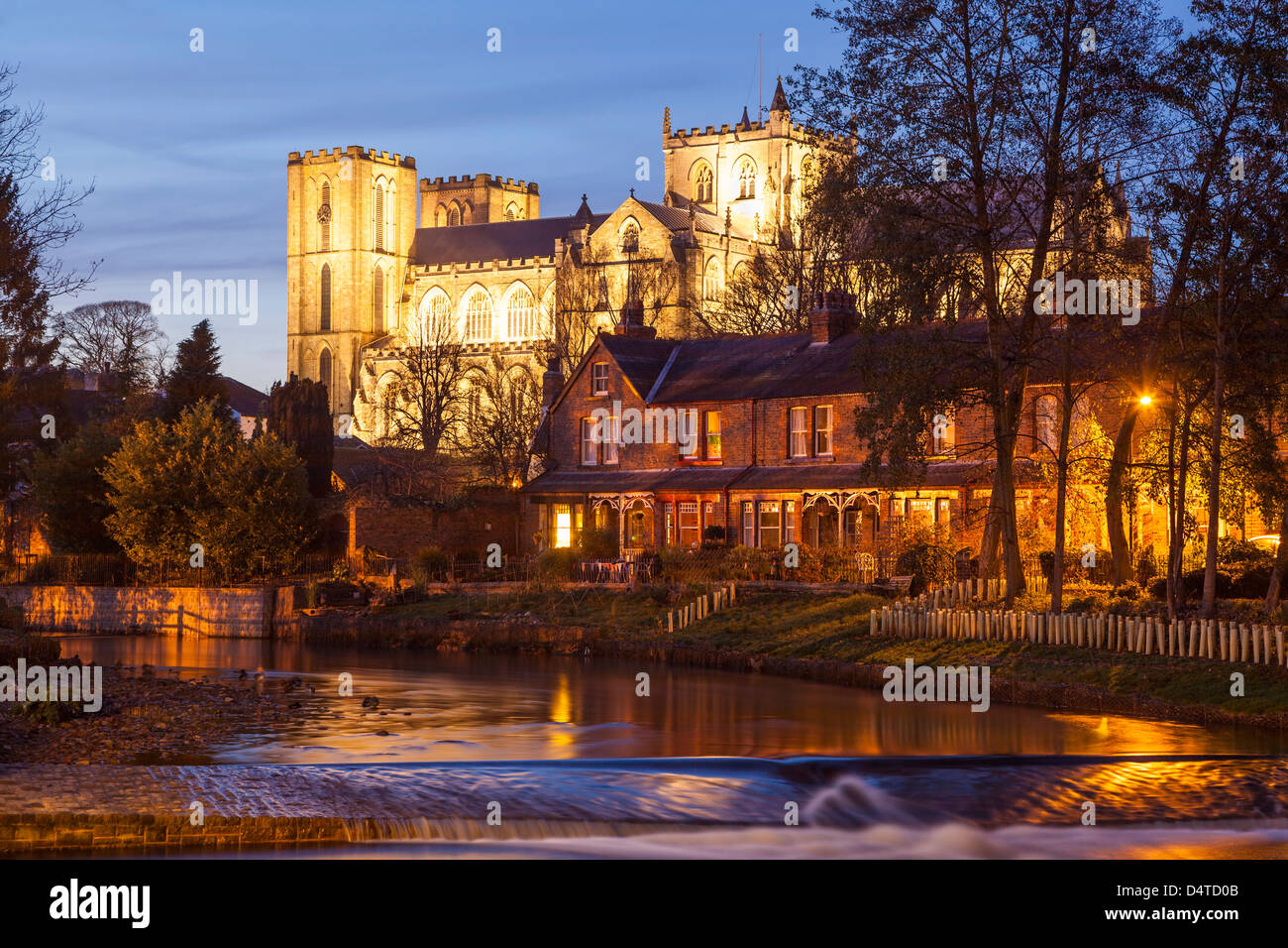 Ripon Cathedral from the river Skell, North Yorkshire. Stock Photo