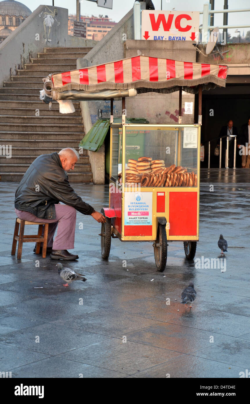 Pretzel seller with pushcart Stock Photo - Alamy