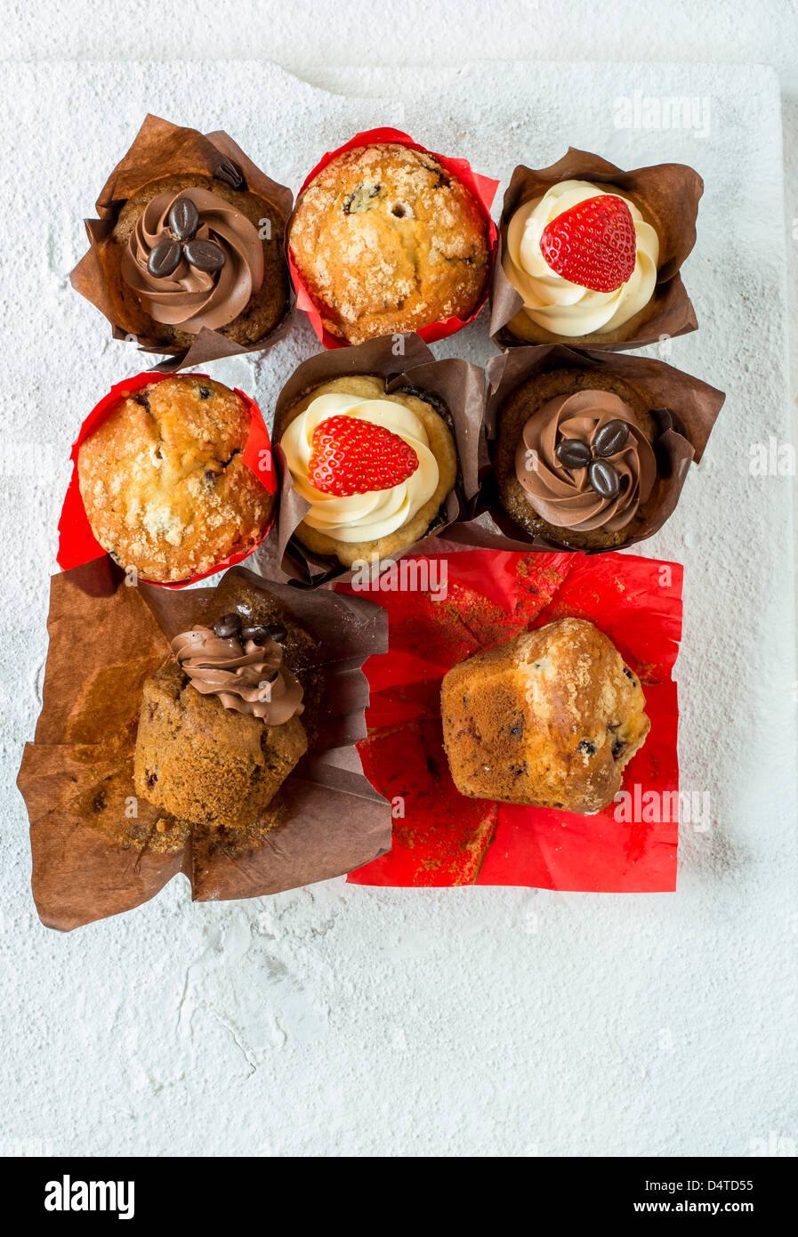 A colourful selection of muffins and cupcakes Stock Photo Alamy