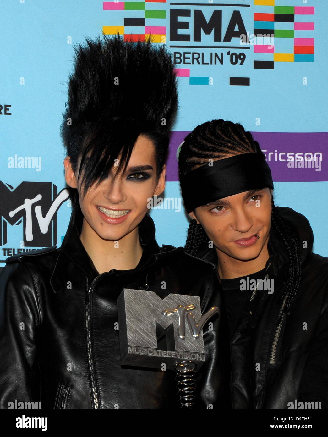 Bill Kaulitz (L) and his brother Tom Kaulitz of the German band Tokio Hotel  pose during a photo call at the MTV Europe Music Awards at O2 World in  Berlin, Germany, 05