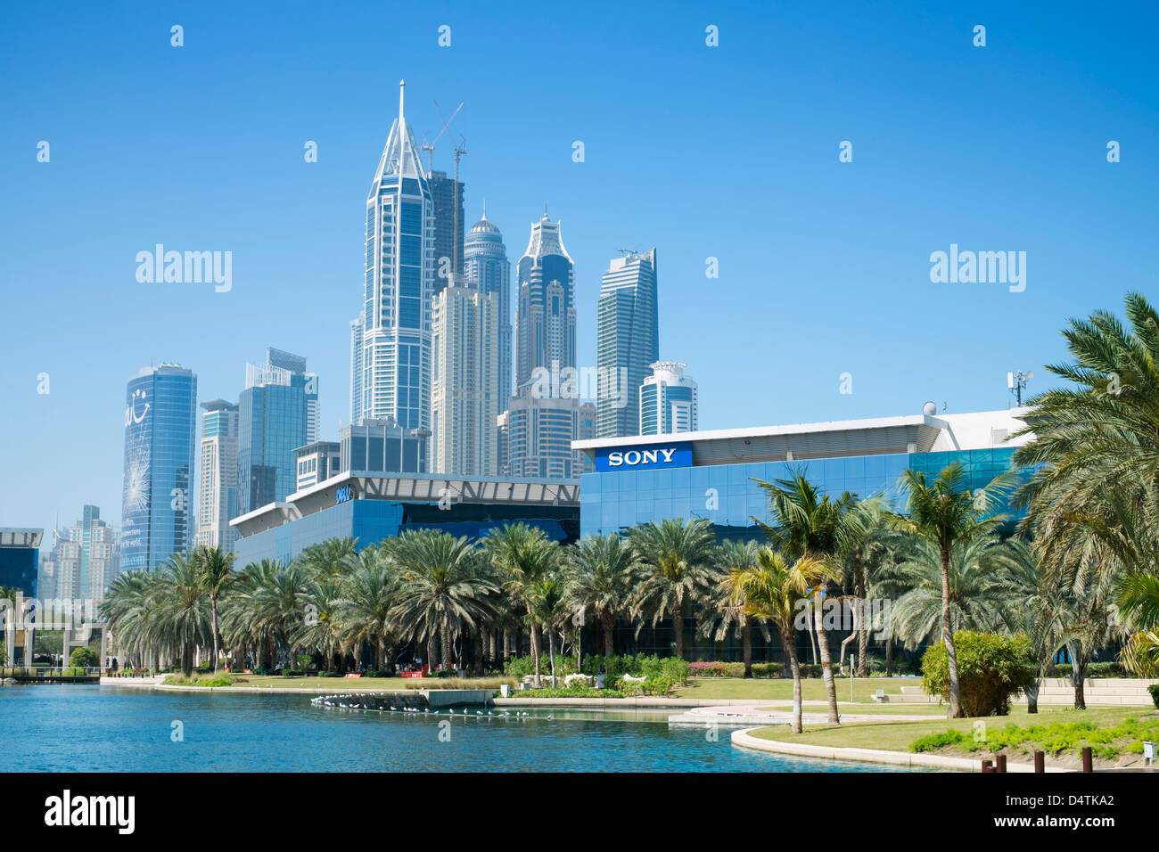 office buildings and landscaped park and lake at Dubai Internet City in United Arab Emirates UAE Stock Photo