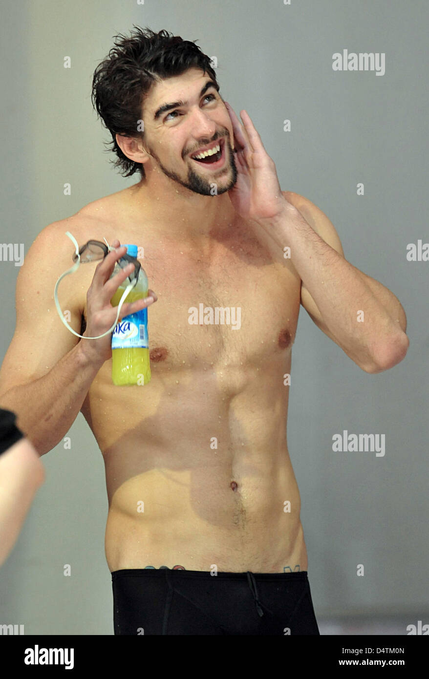 US swimmer Michael Phelps smiles during the short track world cup event in Berlin, Germany, 14 November 2009. Phelps competes in short swim suits, complying with a rule which will be introduced the following year. Photo : Bernd Thissen Stock Photo