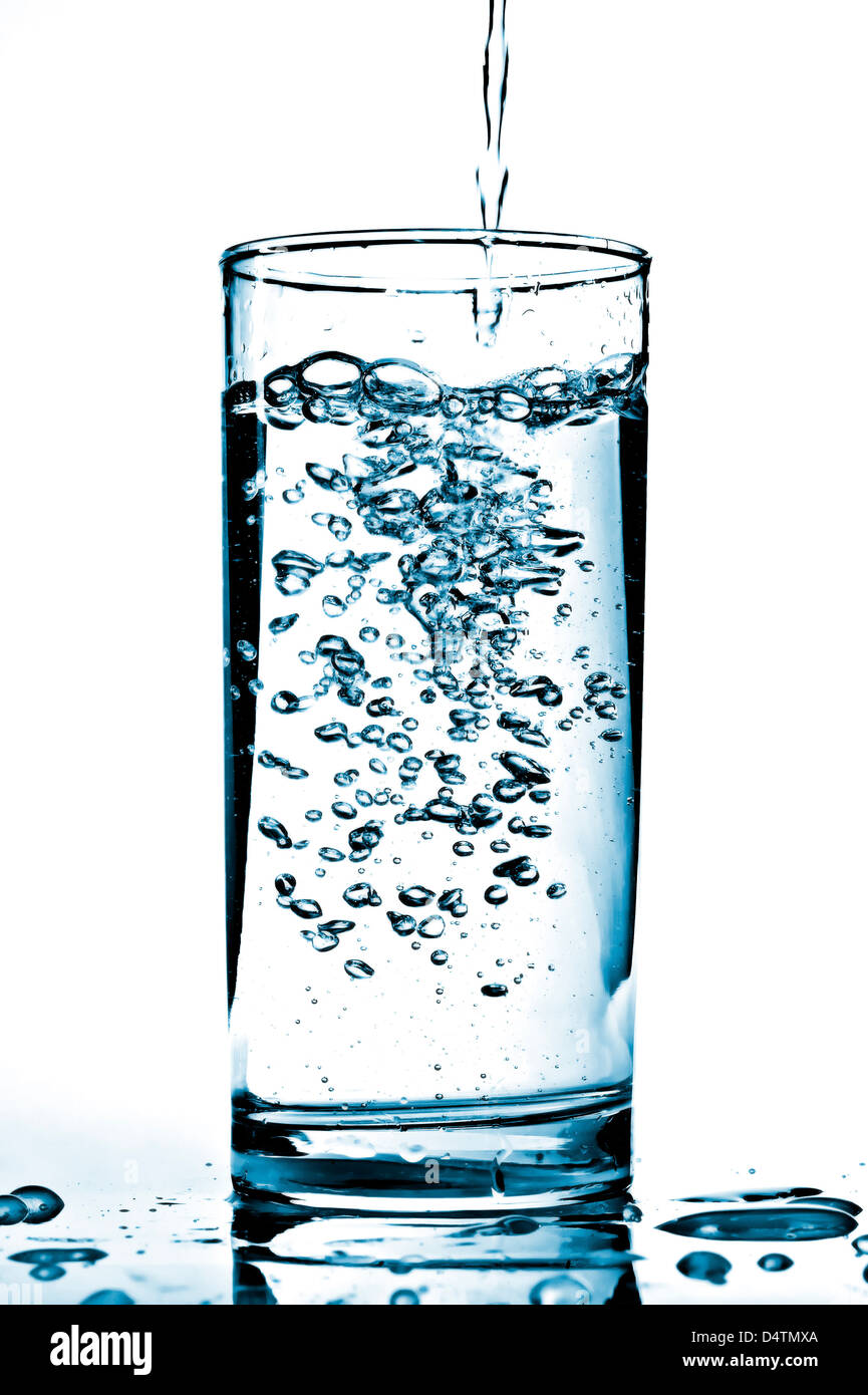 Cold water being poured into a glass Stock Photo Alamy