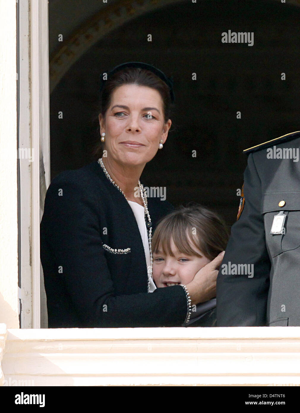 Princess Caroline of Hannover (L) and Princess Alexandra of Hanover (R) smile on a balcony during the Army Parade as part of Monaco?s National Day celebrations in Monte Carlo, Monaco, 19 November 2009. Photo: Albert Nieboer (NETHERLANDS OUT) Stock Photo