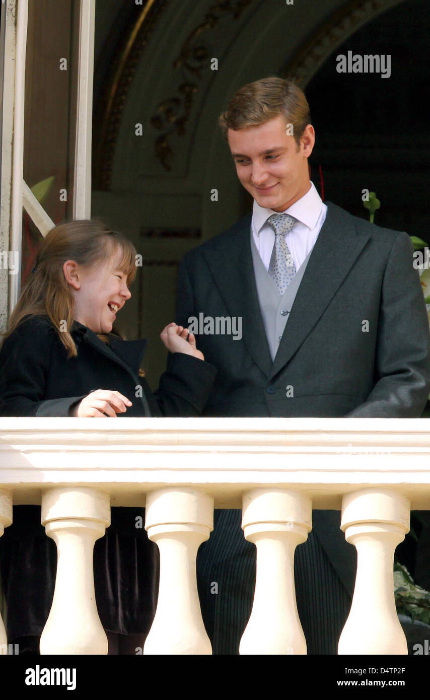 Pierre Casiraghi (R) and Princess Alexandra of Hanover (L) smile on a balcony during the Army Parade as part of Monaco?s National Day celebrations in Monte Carlo, Monaco, 19 November 2009. Photo: Albert Nieboer (NETHERLANDS OUT) Stock Photo