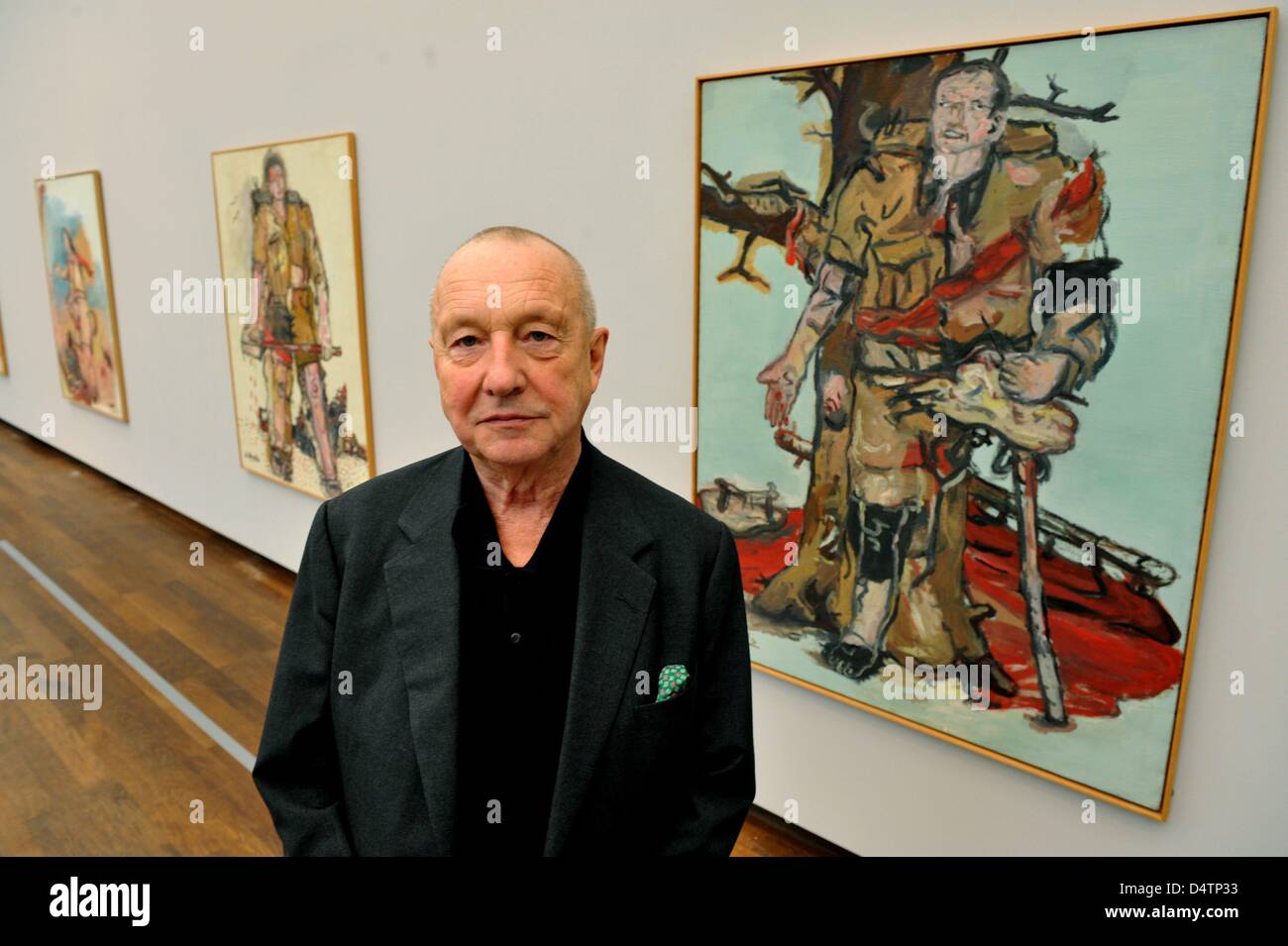 German artist Georg Baselitz stands in front of the painting ?Versperrter Maler? (?Barred Painter?, 1965) in the exhibition ?Baselitz? at Frieder Burda Museum in Baden-Baden, Germany, 17 November 2009. The exhibition offers a comprehensive insight into the artistic work of Georg Baselitz and will be on display at Frieder Burda Museum and Staatliche Kunsthalle Baden-Baden from 21 No Stock Photo
