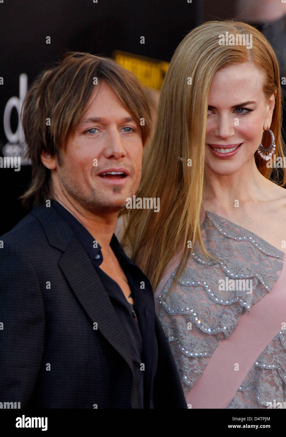 Australian Country Singer Keith Urban L And His Wife Australian Actress Nicole Kidman R Arrive For The American Music Awards 2009 At Nokia Theatre In Los Angeles Ca United States 23 November