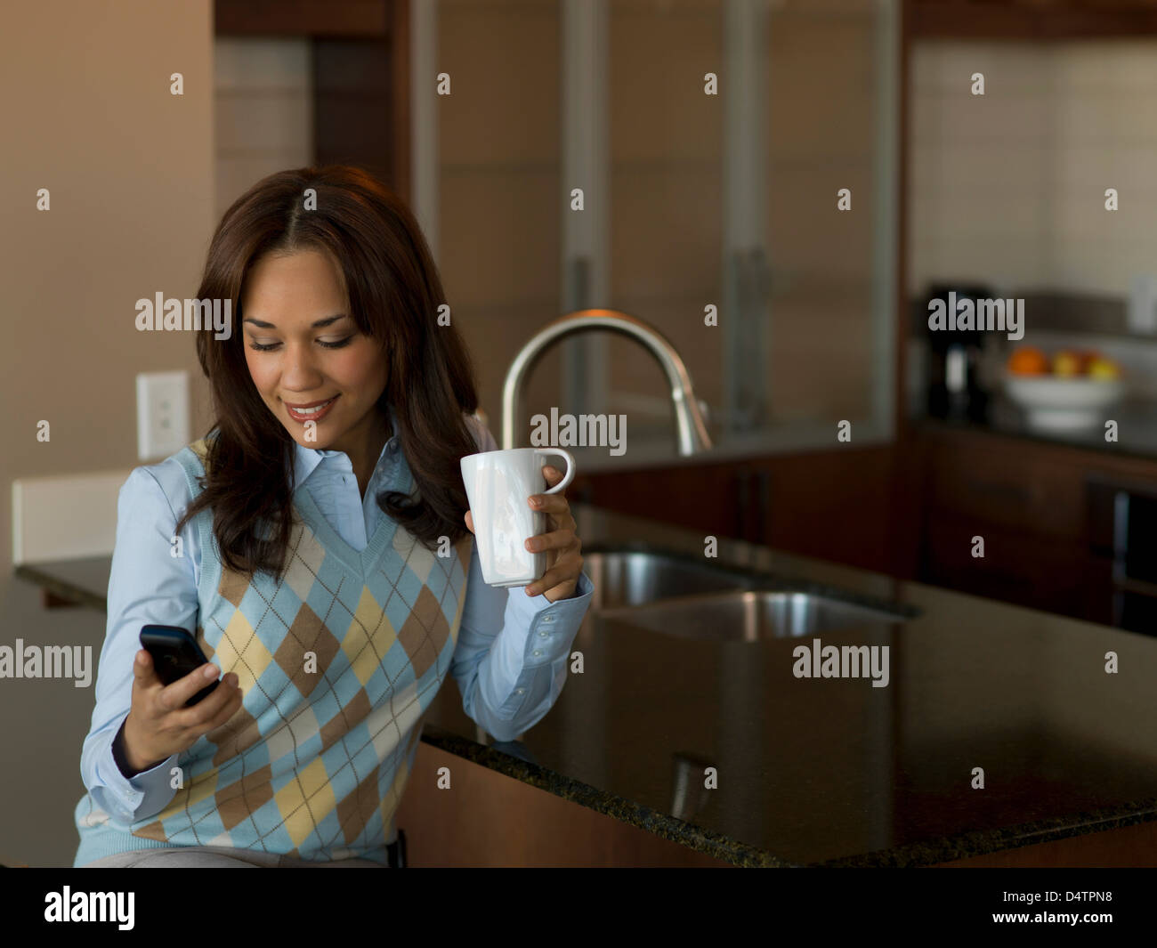 Businesswoman having cup of coffee Stock Photo