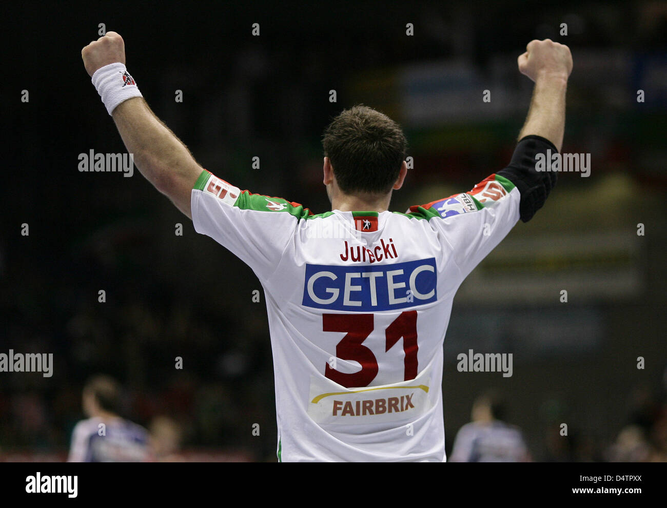 Bartosz Jurecki of Handball Bundesliga club SC Magdeburg celebrates