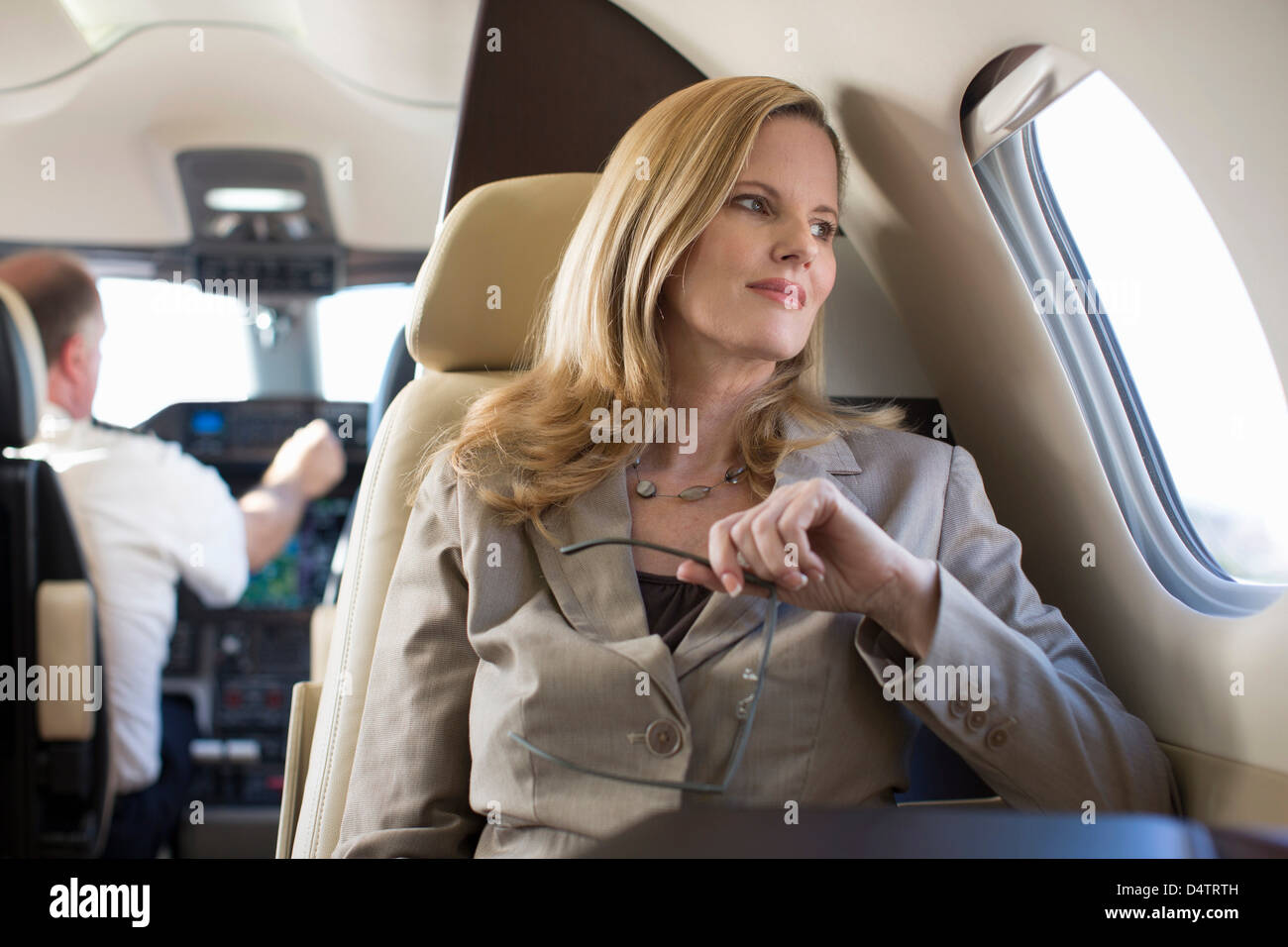 Woman cockpit pilot passenger hi-res stock photography and images - Alamy