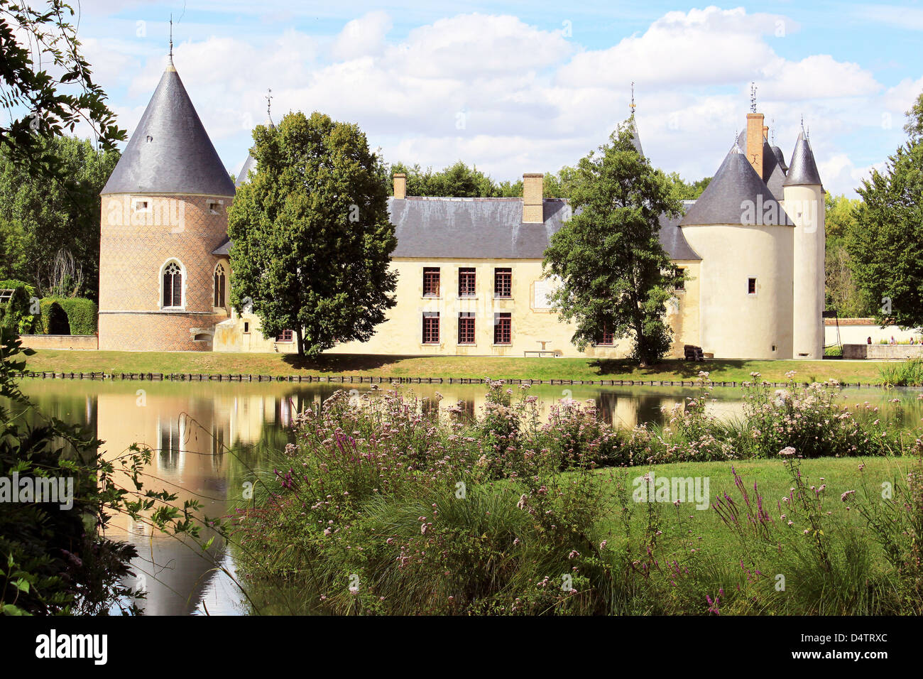 Castle of Chamerolles with its park, its ditches and its bridge levis Stock Photo