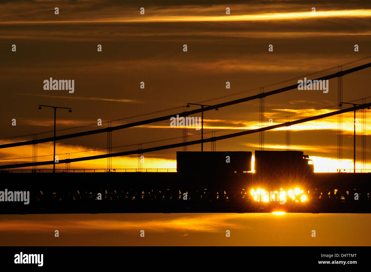 Sunset over bridge when lorry passing, Gothenburg, Sweden, Europe Stock Photo