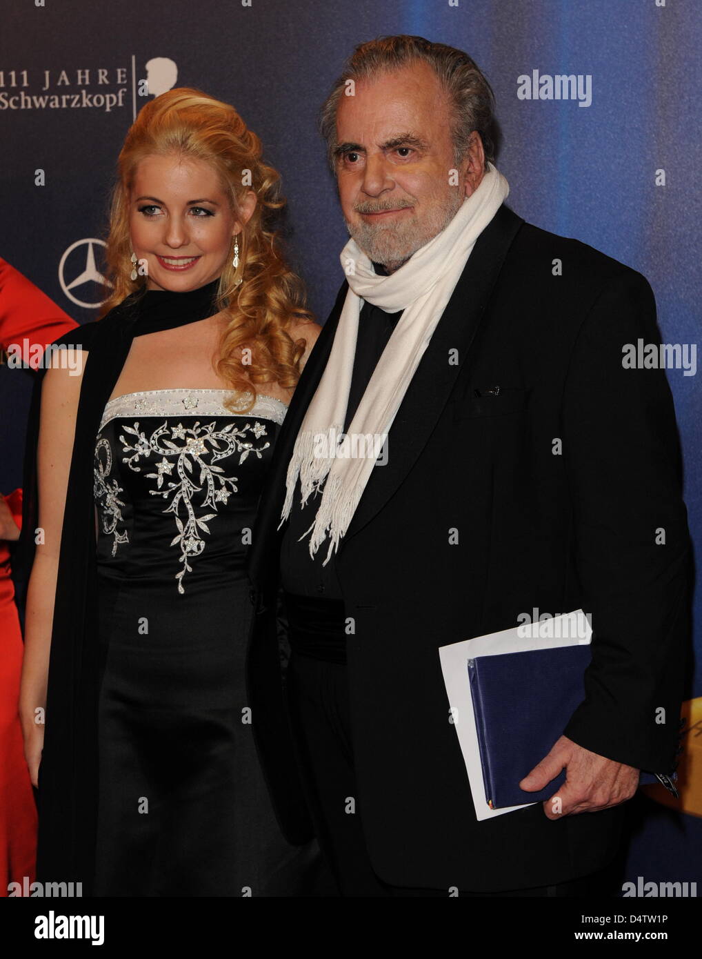 German screen legend Maximilian Schell (R) arrives with his girlfriend Iva Mihanovic for the Bambi 2009 award gala in Potsdam, Germany, 26 November 2009. The Bambi awards are annually awarded by Hubert Burda Media, this year?s Bambi is the 61st edition. It is the oldest and most important media award in Germany. Photo: Jens Kalaene Stock Photo