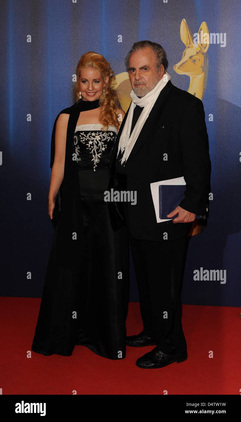 German screen legend Maximilian Schell (R) arrives with his girlfriend Iva Mihanovic for the Bambi 2009 award gala in Potsdam, Germany, 26 November 2009. The Bambi awards are annually awarded by Hubert Burda Media, this year?s Bambi is the 61st edition. It is the oldest and most important media award in Germany. Photo: Jens Kalaene Stock Photo