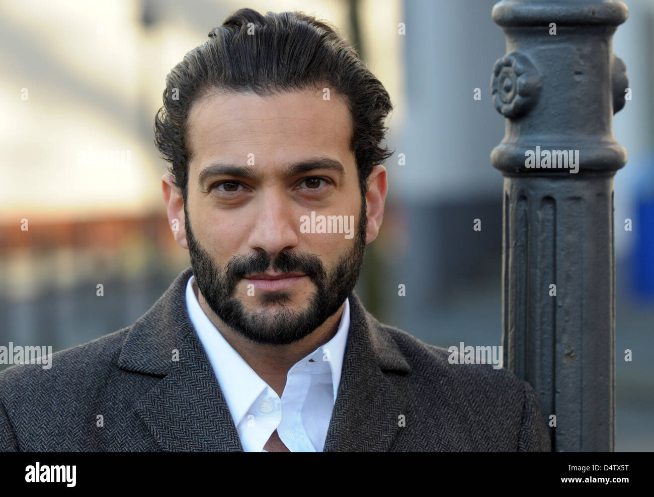 Turkish actor Erhan Emre poses for photographers during the shooting of the thriller 'Takiye - Im Namen Gottes' (litt. 'Takiye - In the Name of God')in Duisburg, Germany, 30 November 2009. The film tells the story of a Turkish family breaking apart as it becomes involved in a criminal organistaion claiming to act in the name of god. The film is scheduled to be aired in autumn 2010  Stock Photo