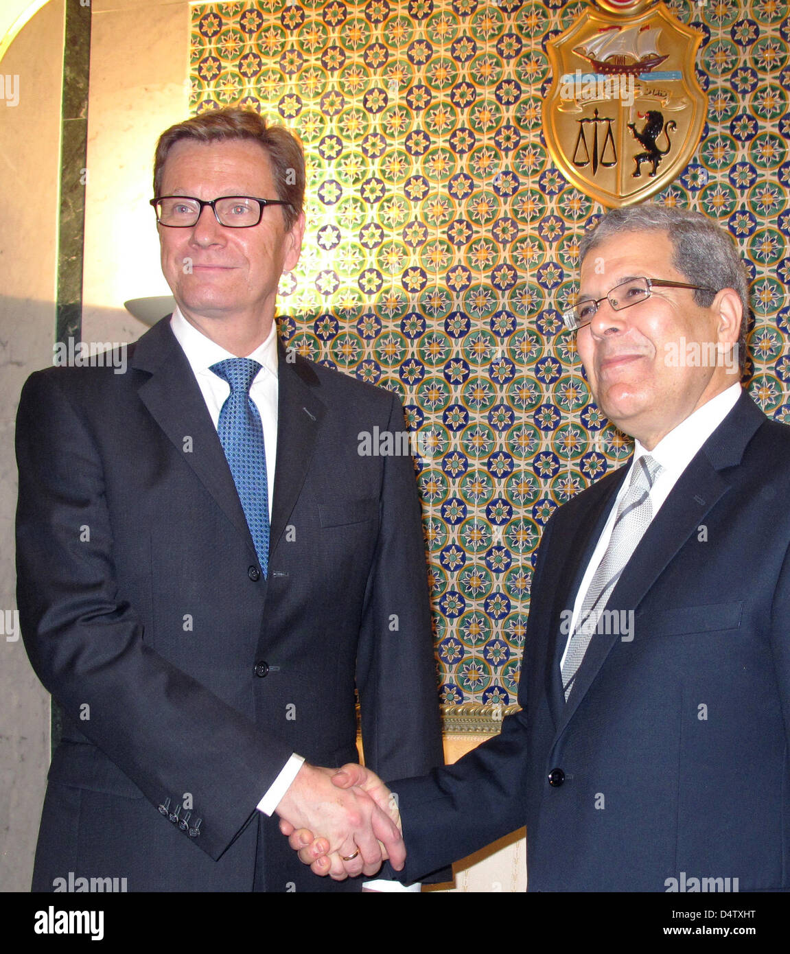 German Foreign Minister Guido Westerwelle (L) meets Tunisian Foreign Minister Othman Jarandi in Tunis, Tunisia, 19 March 2013. Germany wishes to continue supporting the north African country in its democratisation. Photo: SASCHA MEYER Stock Photo
