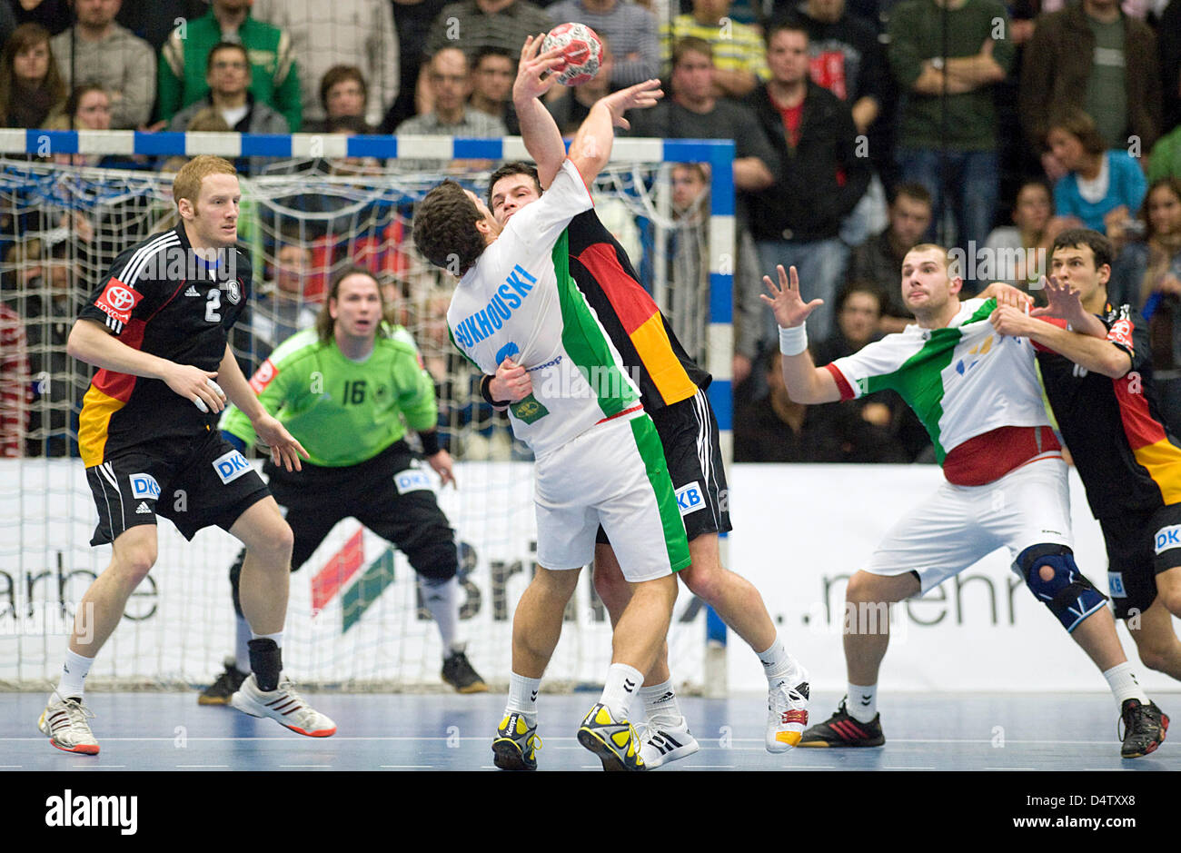 Germany's Stefan Kneer, goal keeper Niko Katsigiannis, Matthias Flohr