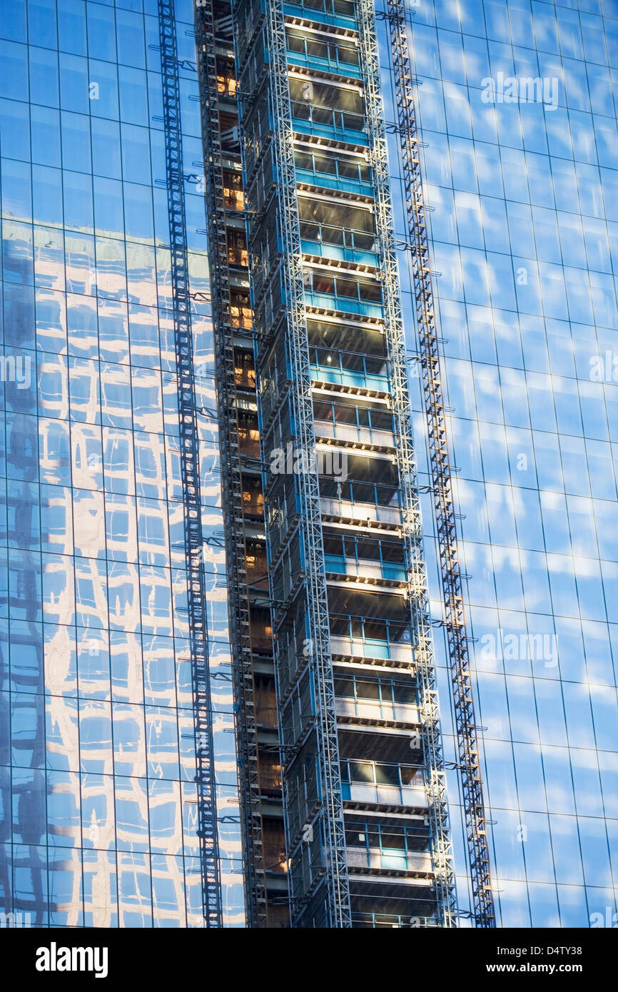 Scaffolding on urban skyscraper Stock Photo