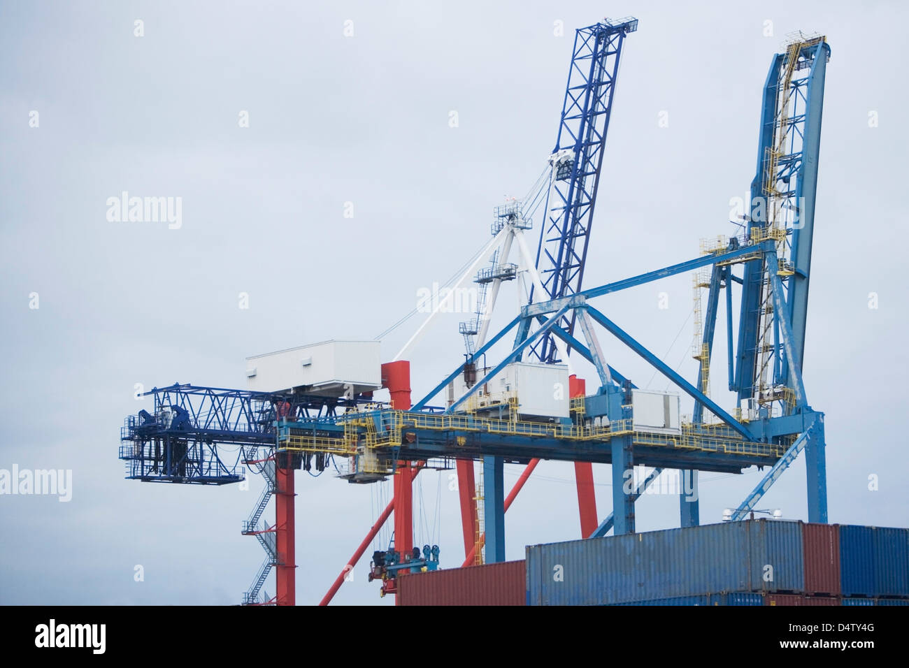 Crane and containers on loading dock Stock Photo