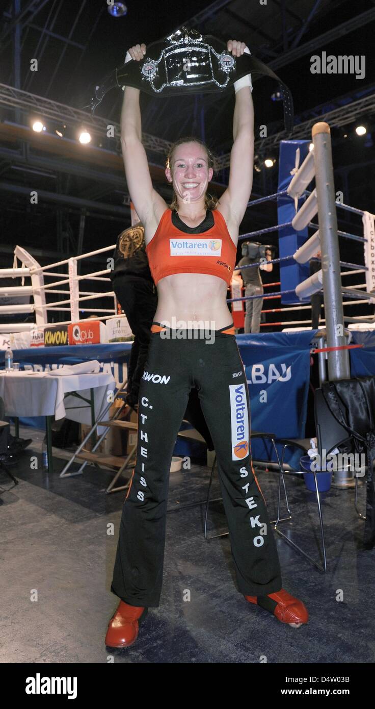 German kickboxing champion Christine Theiss (R) defends her title