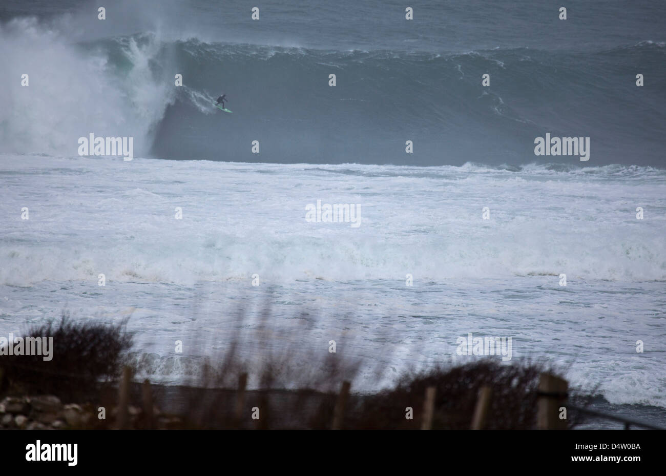 Big wave surfing at Mullaghmore Head, County Sligo, Ireland. Stock Photo