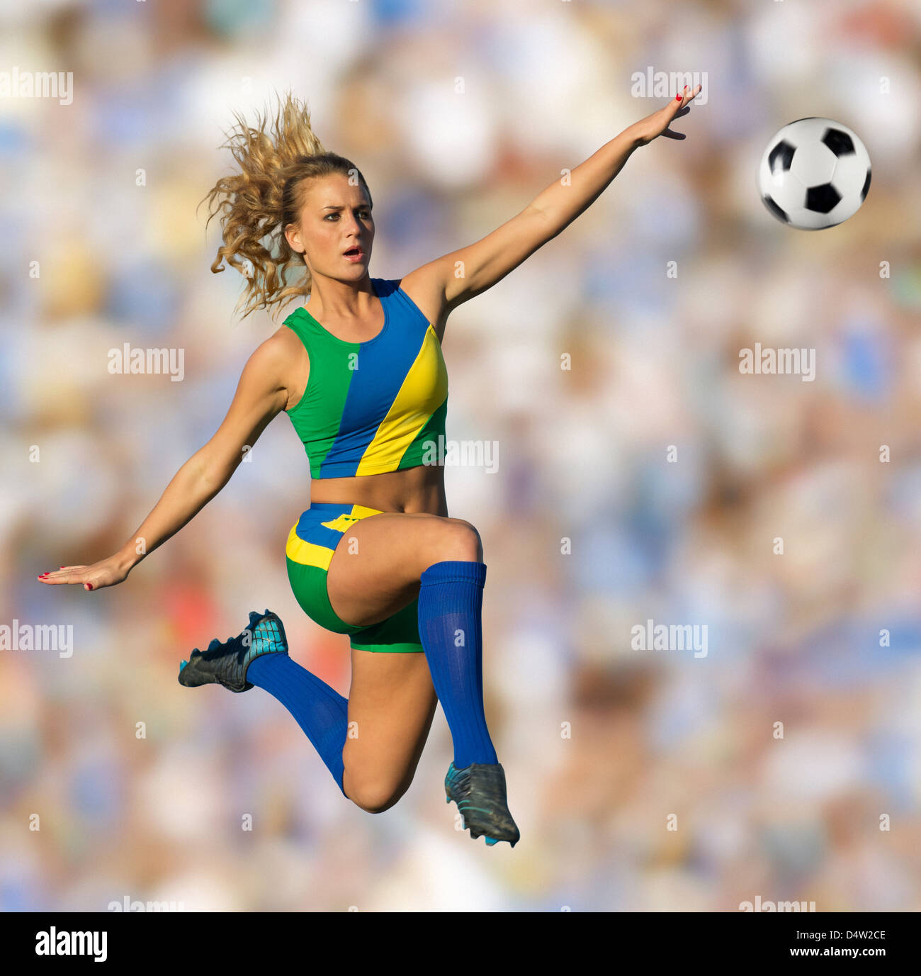 Brazilian soccer player in mid-air Stock Photo