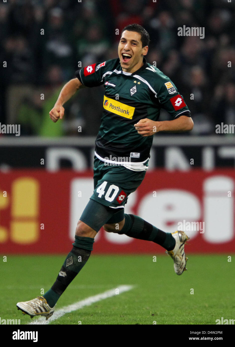 Moenchengladbach's Karim Matmour cheers after Hanover's Constant Djakpa's (not pictured) own goal during the German Bundesliga match Borussia Moenchengladbach vs Hanover 96 at Borussia-Park Stadium in Moenchengladbach, Germany, 12 December 2009. Moenchengladbach won the match 5-3- Photo: ROLF VENNENBERND (ATTENTION: EMBARGO CONDITIONS! The DFL permits the further utilisation of the Stock Photo
