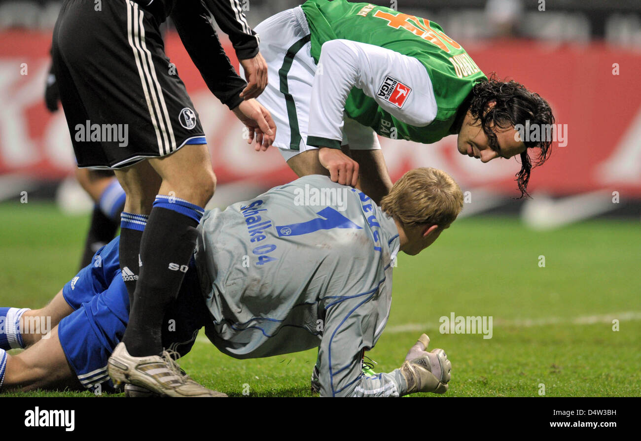 Bremen S Claudio Pizarro R Talks To Schalke S Goalkeeper Manuel Stock Photo Alamy