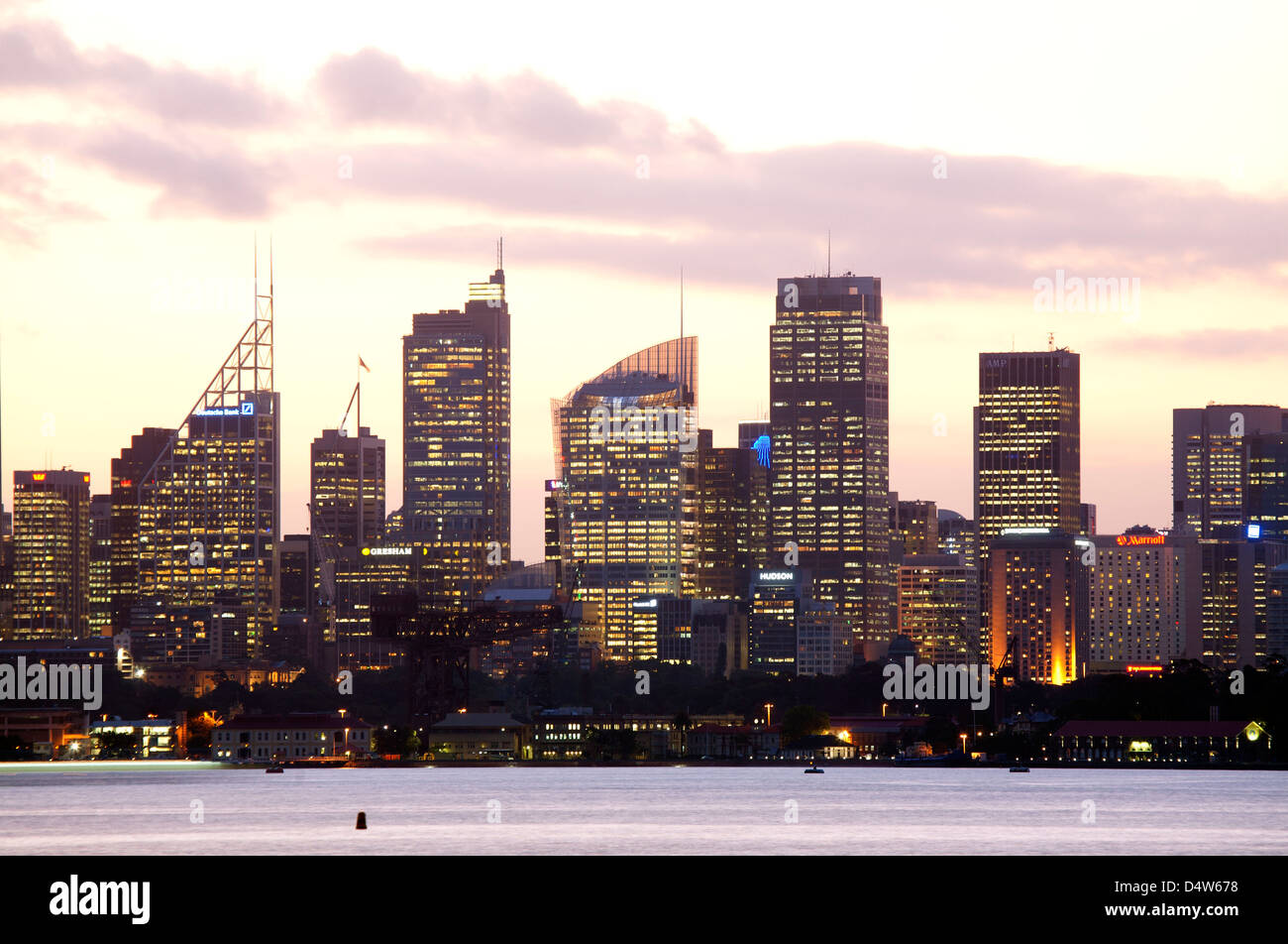 Twlight glow of Sydney CBD office buildings after sunset Sydney Harbour Sydney Australia Stock Photo