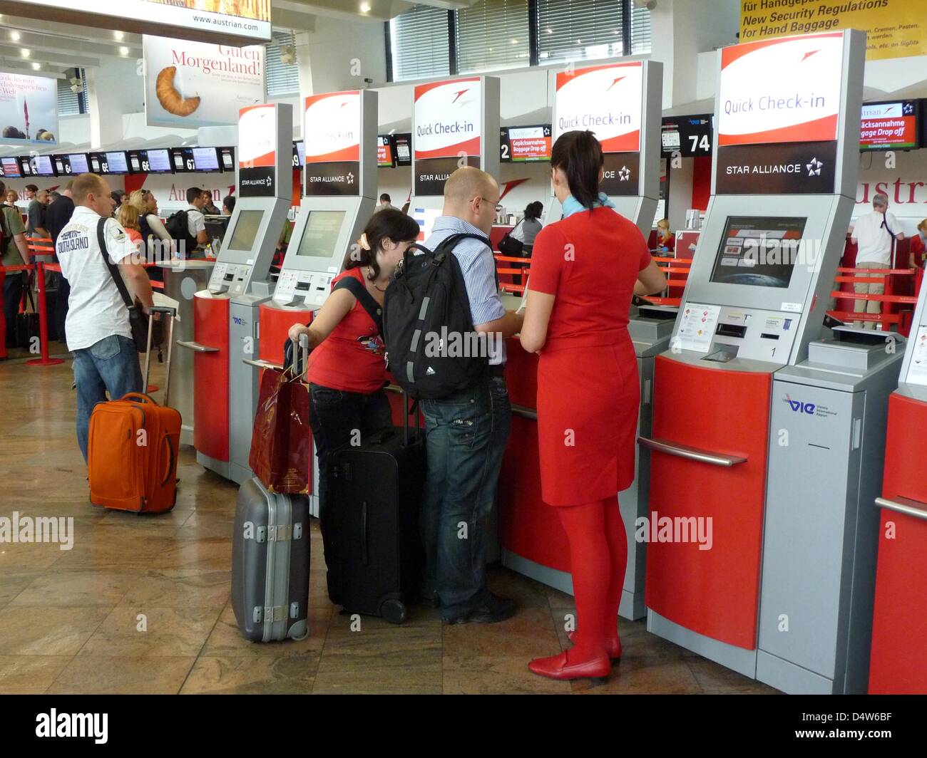 The check-inn area at the airport in Vienna Schwechat, Austria, 10 August  2009. ?Austrian arrows operated by Tyrolean? is the regional airline of  Austrian Airlines Group. Photo: Beate Schleep Stock Photo - Alamy