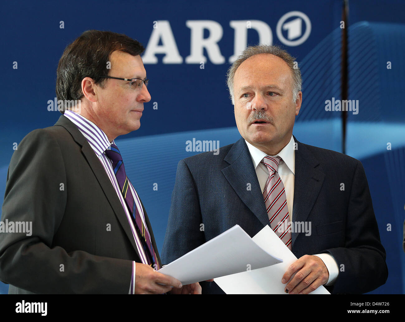 Chairman of broadcaster ARD, Peter Boudgoust, talks to the director of ...
