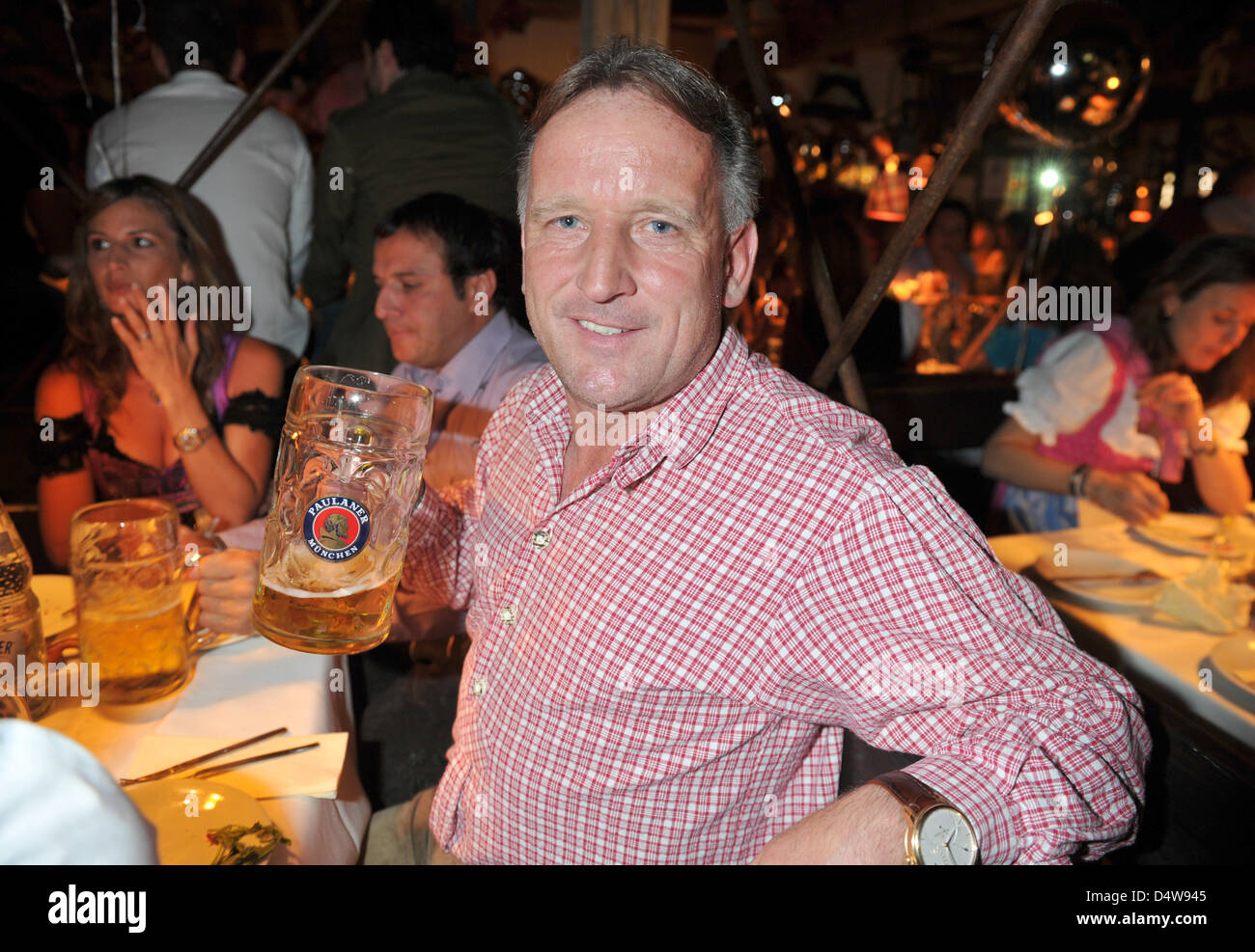 Former German soccer international Andreas Brehme poses for a picture at the 'Almauftrieb' event at the Oktoberfest in Munich, Germany, 19 September 2010. The world's biggest folk festival takes place from 18 September until 03 October 2010 for the 177th time. A total of six million visitors are expected. Photo: Felix Hoerhager Stock Photo