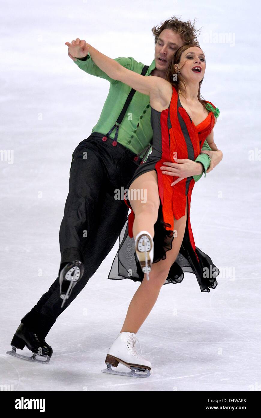 French figure skaters  Nathalie Pechalat and Fabian Bourzat dance during the Ice Dance discipline at the 42nd Nebelhorn Trophy in Oberstdorf, Germany, 23 September 2010. Photo: Karl-Josef Hildenbrand Stock Photo