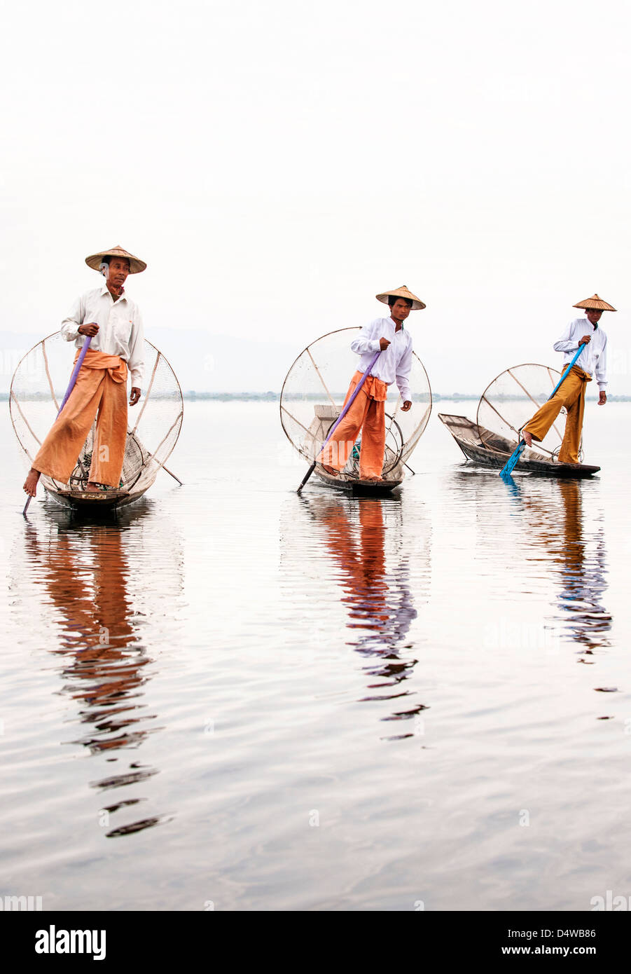 Traditional Intha fishermen on Inle Lake, Burma Stock Photo