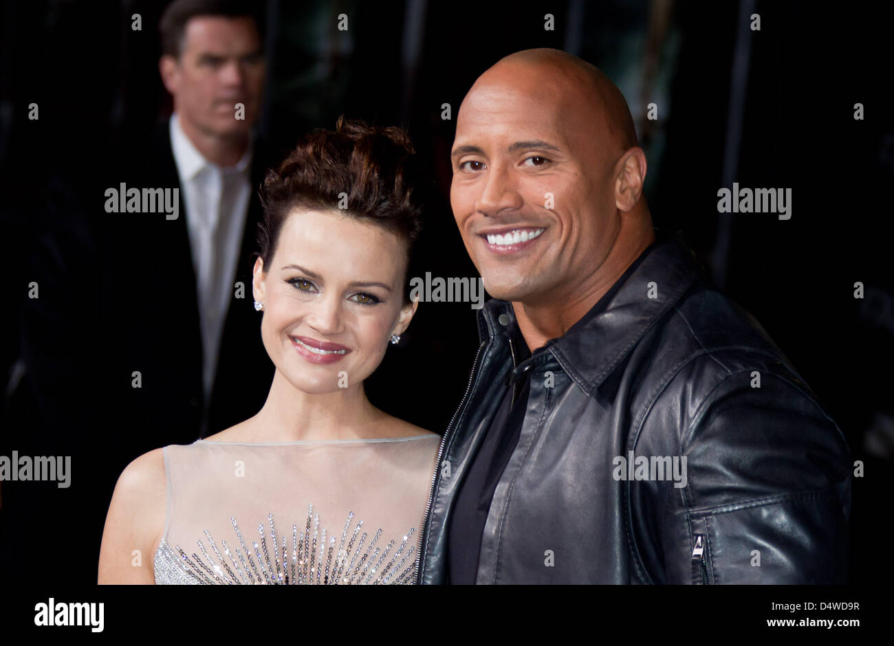 US actress Carla Gugino (L) and US actor  Dwayne 'The Rock' Johnson attend the premiere of the film 'Faster' at Grauman's Chinese Theatre in Los Angeles, USA, 22 November 2010. Photo: Hubert Boesl Stock Photo