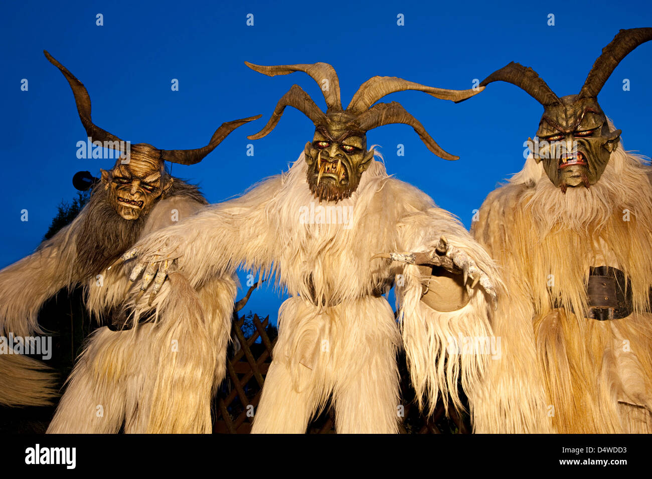 Handmade monster costumes and masks of the mythical creatures Klausen, Krampusse and Perchten are worn during a traditional folk celebration in the Allgaeu region in Boerwang, Germany, 20 November 2010. The alpine tradition is meant recall old pre-christian christmas traditions and keep away evil spirits. Photo: Andreas Ellinger Stock Photo