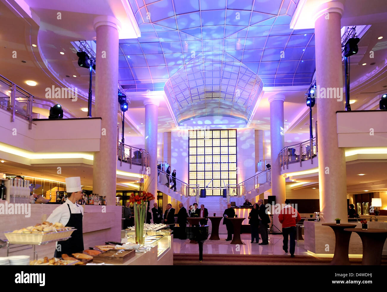 The lobby of the Hilton Hotel reopens after renovation works in Berlin ...