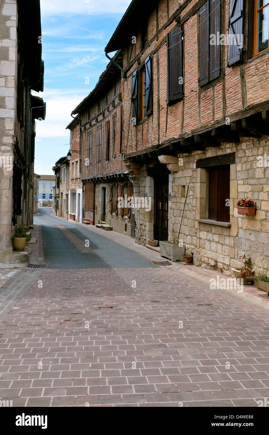 Street and typical building of old village of Castelnau of Montmiral in southern France, Midi-Pyrénées region, Tarn department Stock Photo