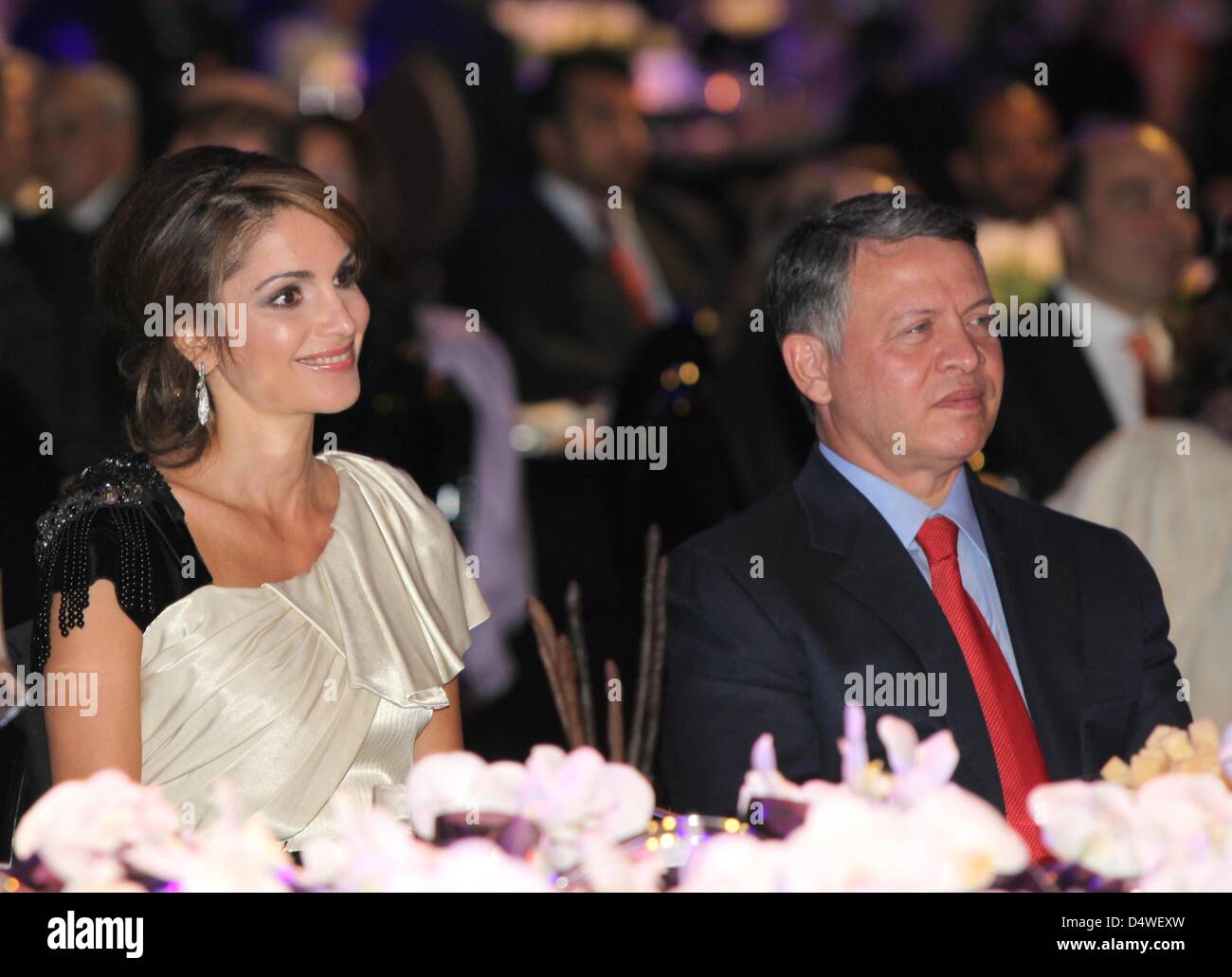 King Abdullah II of Jordan and his wife Queen Rania attend the Jordan 