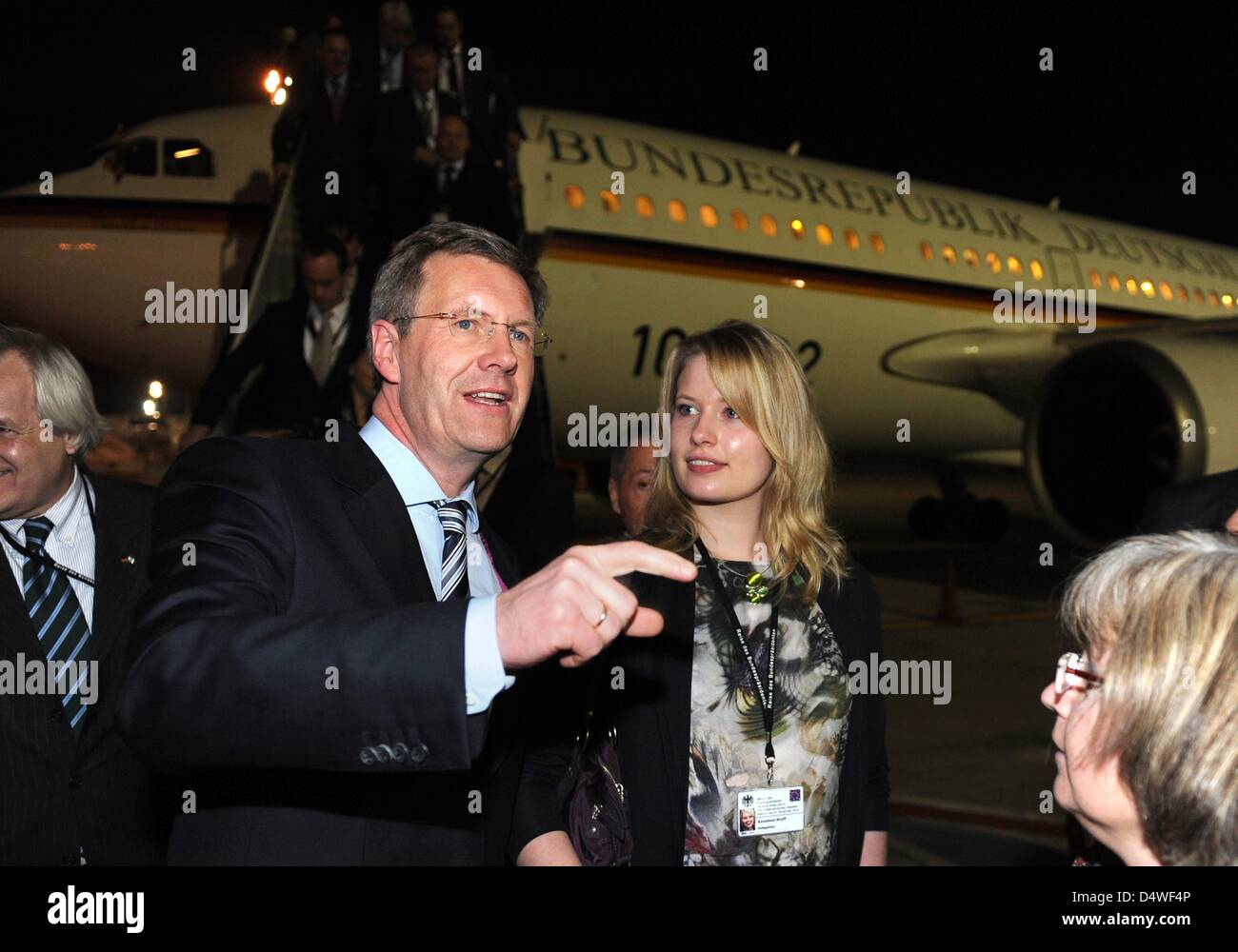 German President Christian Wulff and daughter Annalena are welcomed in Tel Aviv, Israel, 27 November 2010. Wulff's 17-year-old daughter accompanies Mr Wulff on his four-day visit to Israel in stead of his wife Bettina. The choice of travel companion is supposed to symbolize the importance of transmitting the memory of the Holocaust to younger generations. Photo: RAINER JENSEN Stock Photo