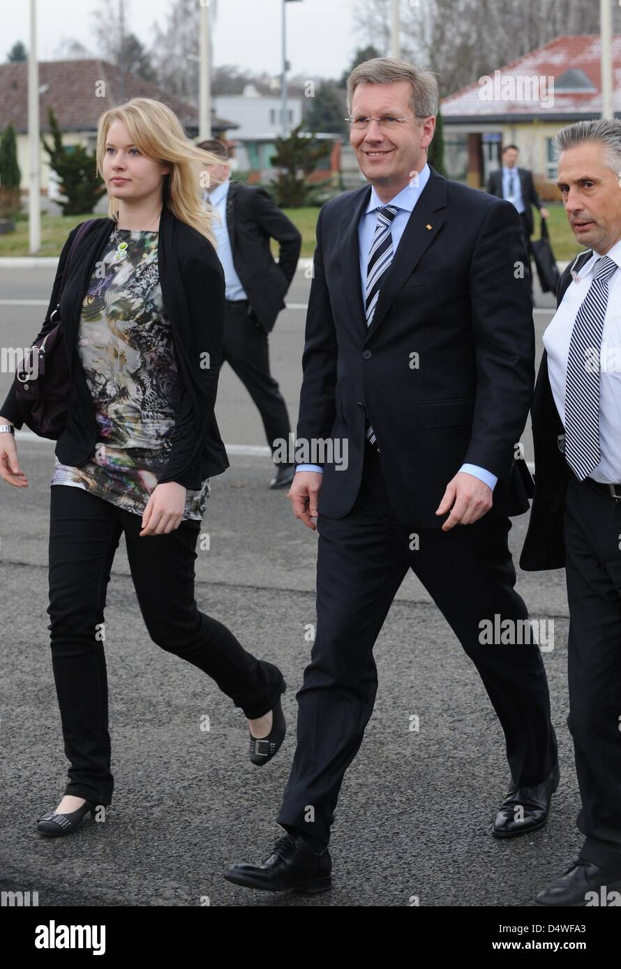 German President Wulff and his daughter Annalena walk to their plane to Israel at Tegel Airport in Berlin, Germany, 27 November 2010. Annalena Wulff will take the place of Wulff's wife Bettina during the 4-day state visit. Photo: Rainer Jensen Stock Photo