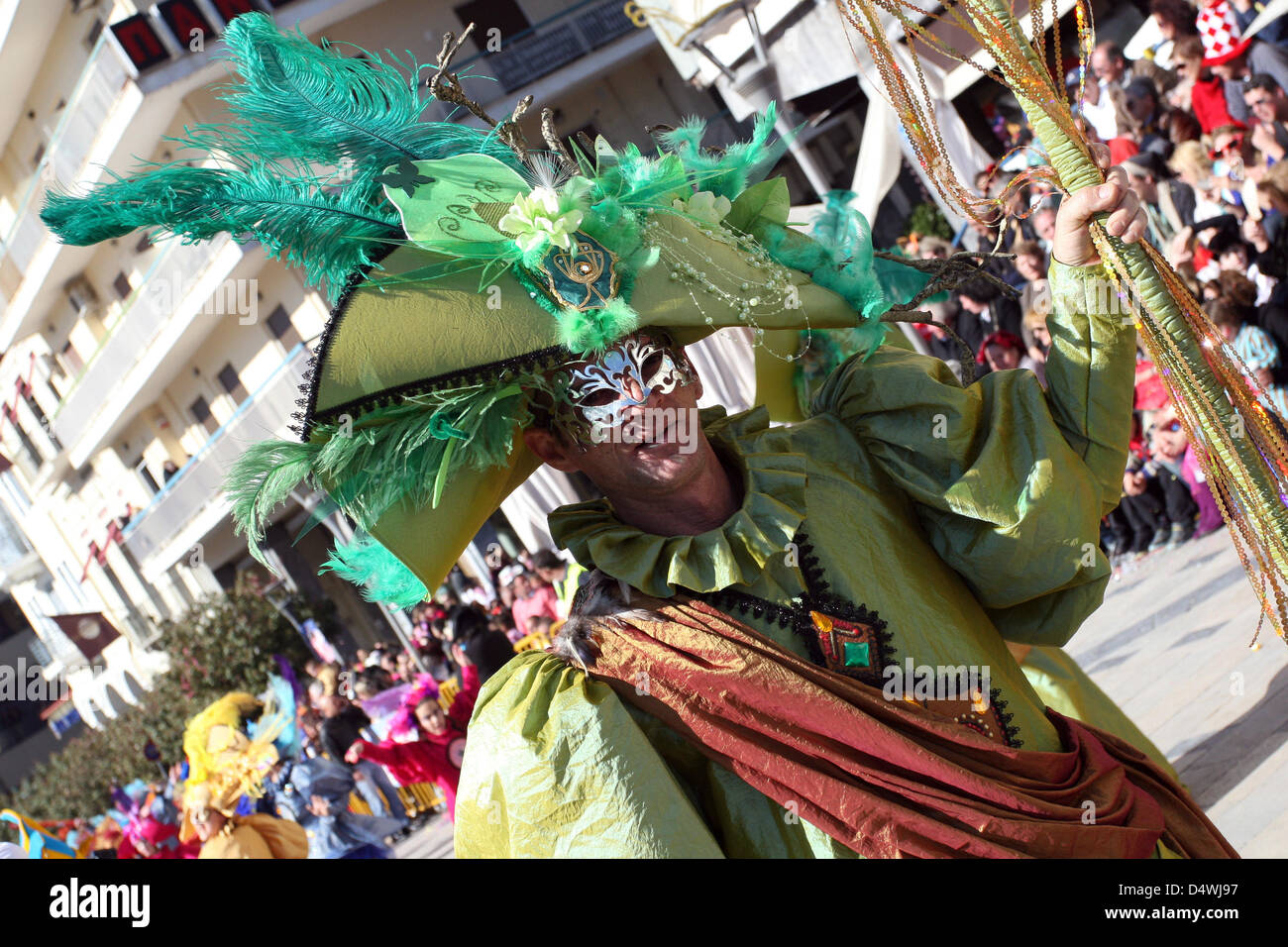 Patras, Greece. 17th March 2013. Revellers dance in colorful costumes at Carnival in  Patras, in Greece, 17 March 2013. The Patras Carnival is the biggest event of its kind in Greece and one of the biggest in Europe. Photo: Menelaos Michalatos/dpa/Alamy Live News Stock Photo