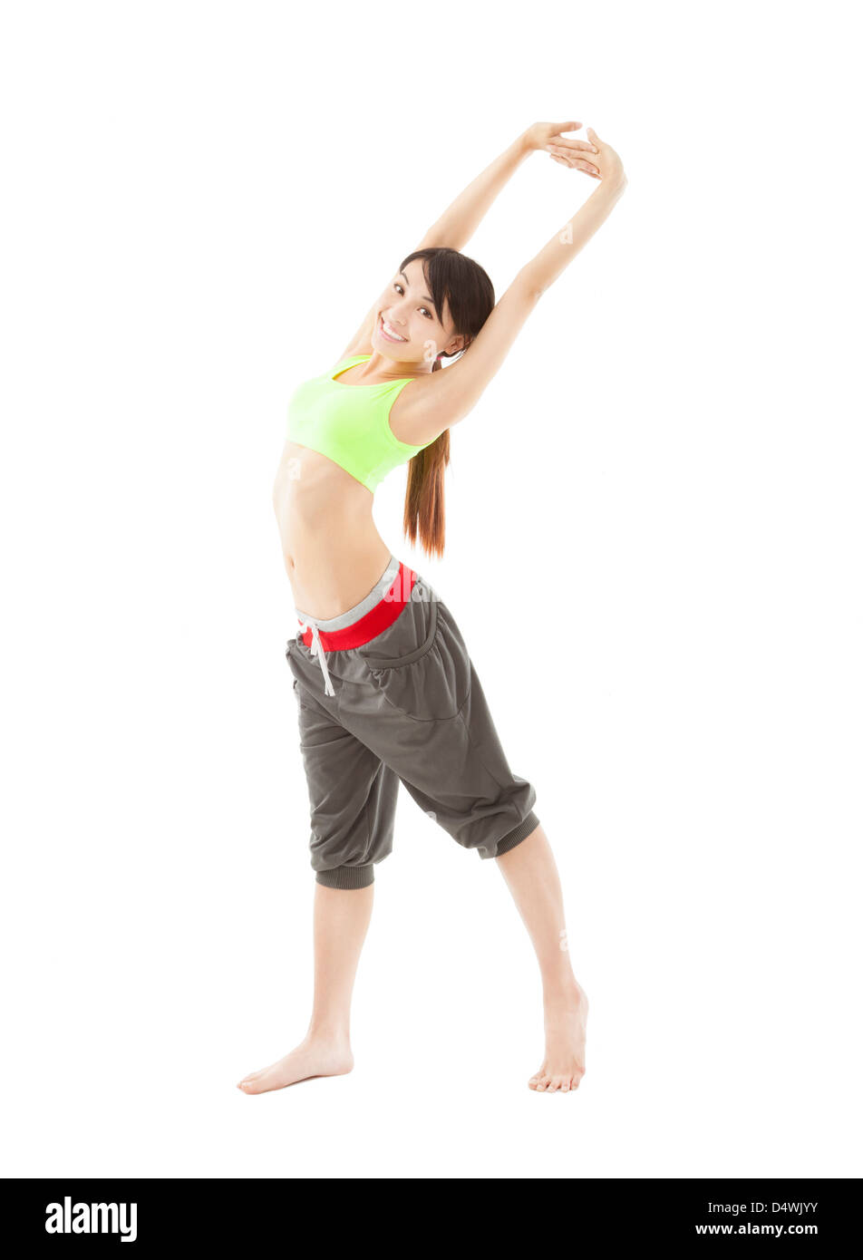 happy young woman doing stretch exercise isolated on white Stock Photo