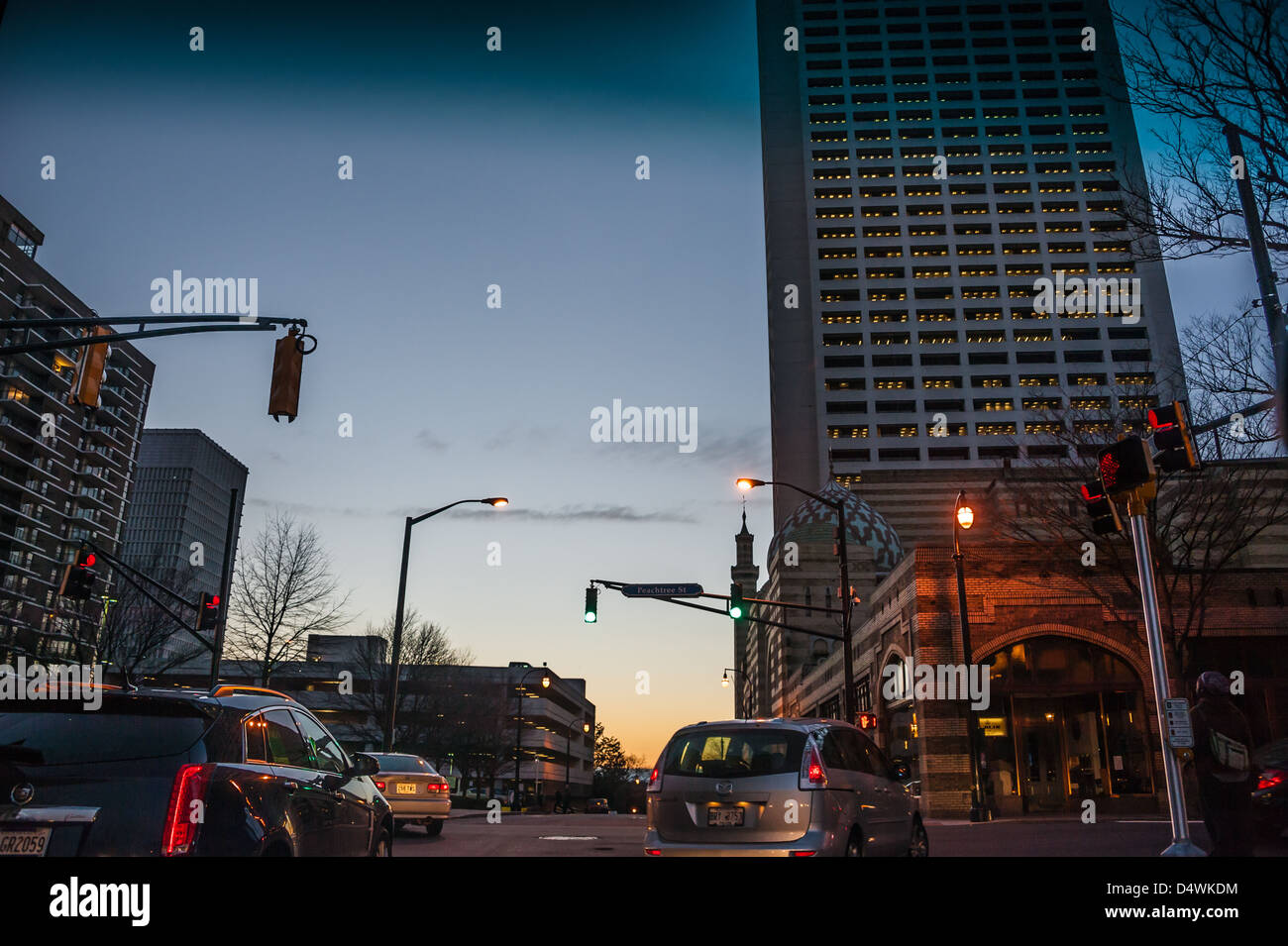 Evening street scene at Peachtree Road and Ponce de Leon Avenue in Atlanta, next to the